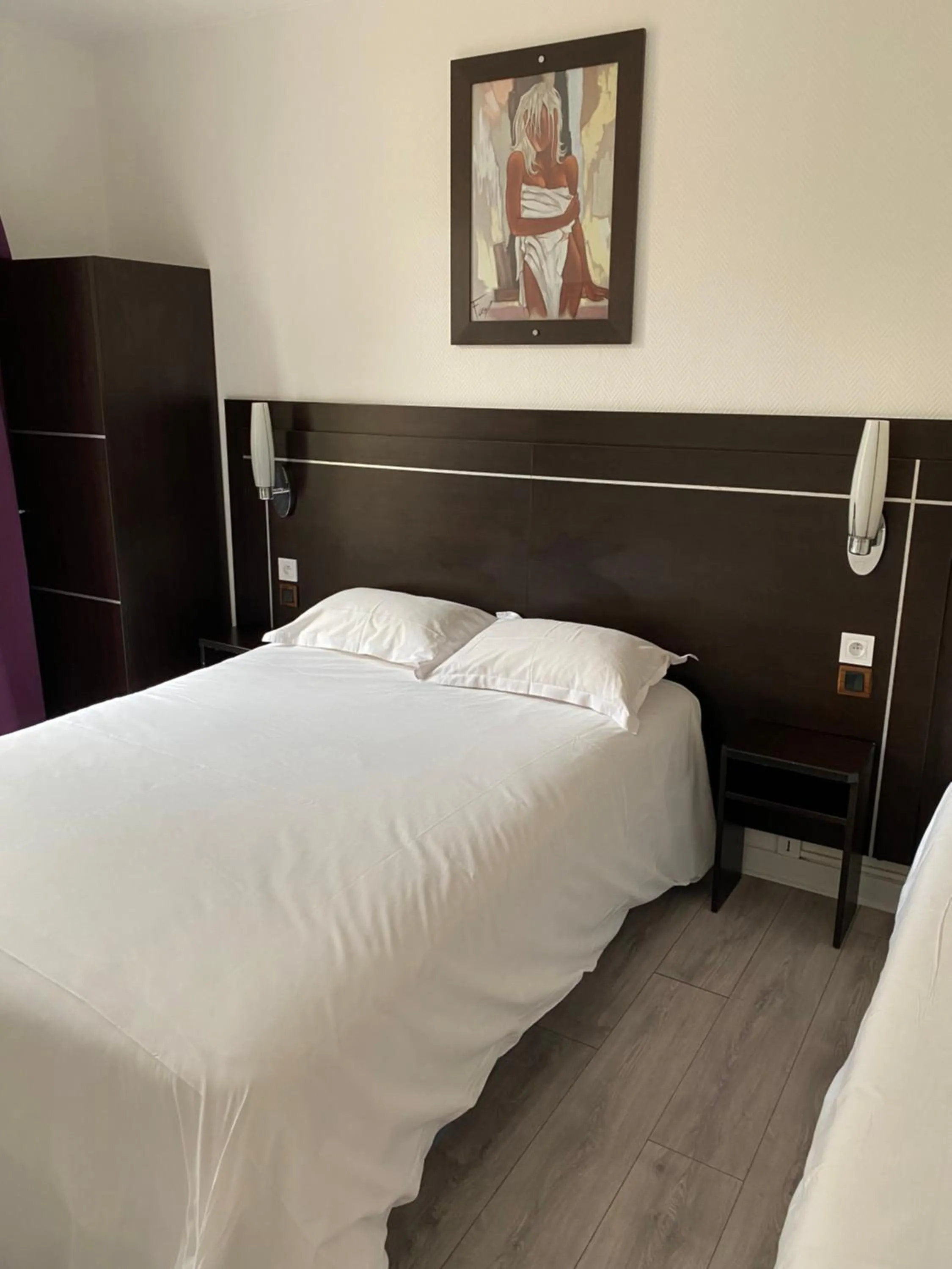 Bed in Hôtel Le Home Saint Louis