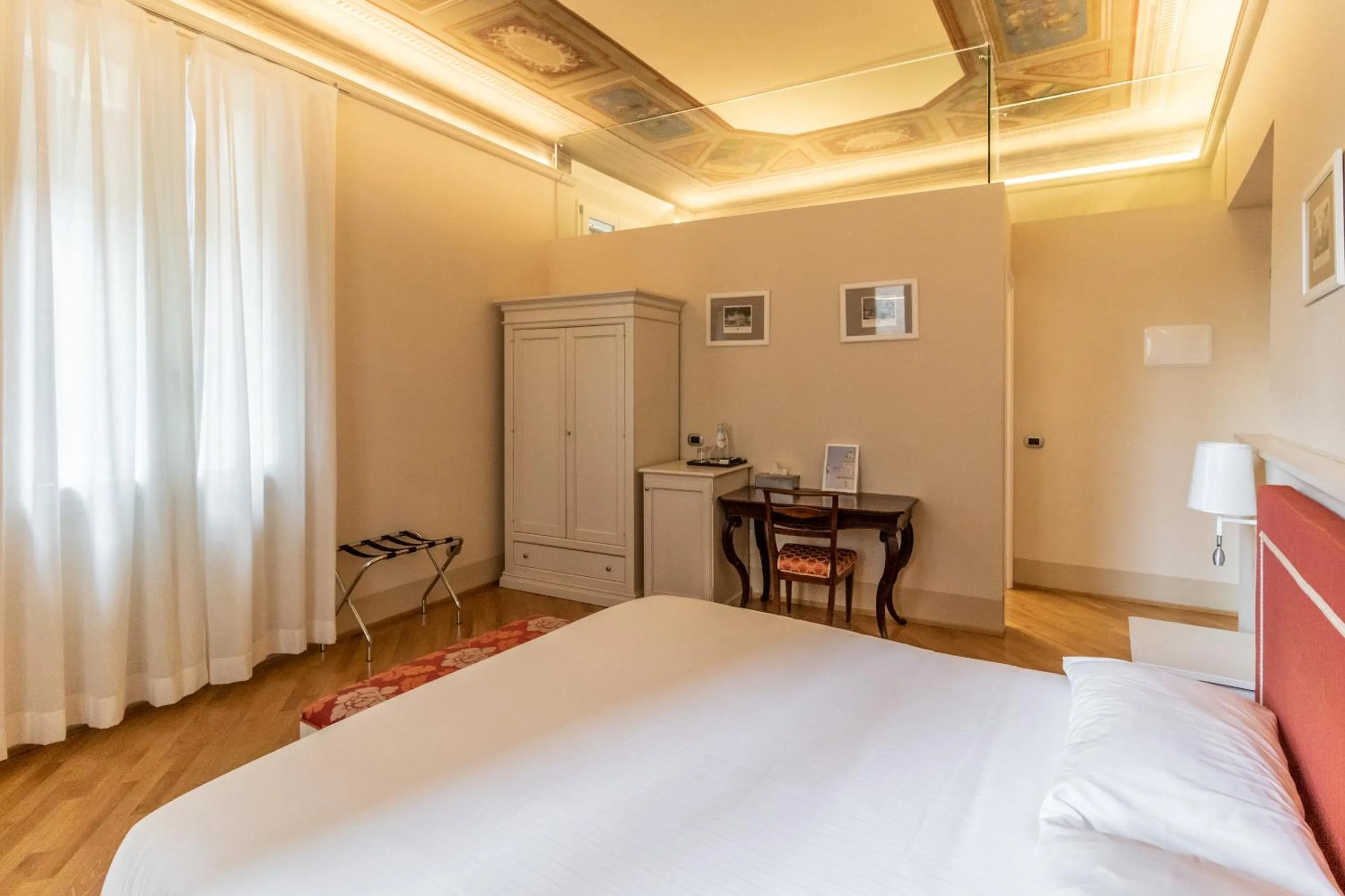 Bed in Casa Isolani Luxury Rooms Piazza Maggiore 1
