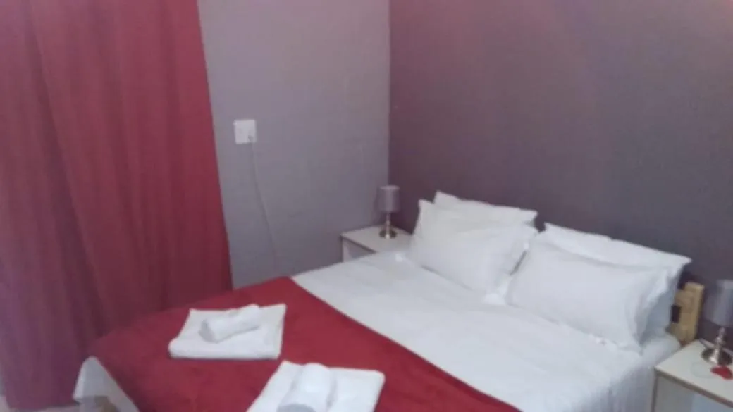 Bed in Beulahland Guesthouse