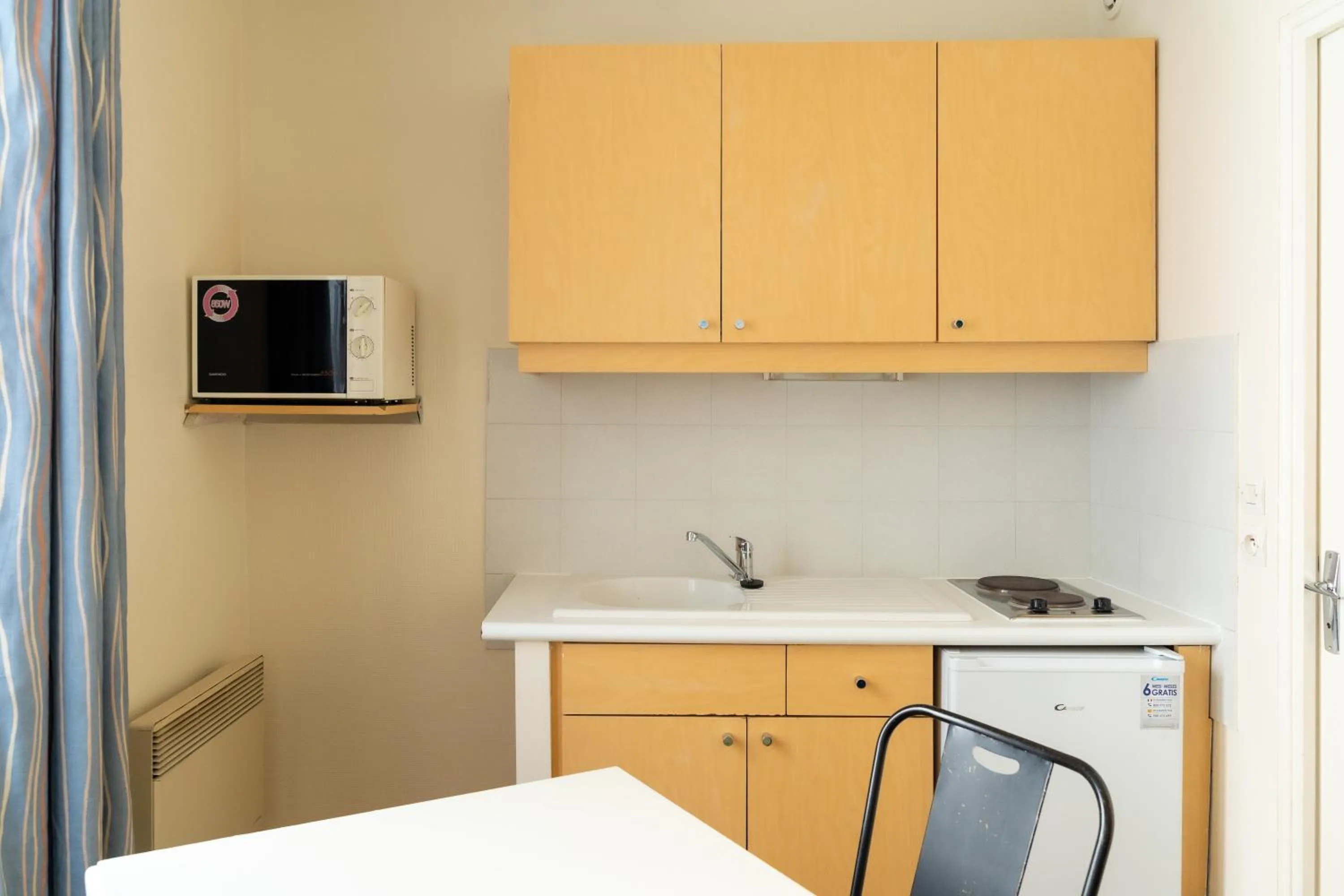 Kitchen or kitchenette in Hôtel Capfun Le Saint Germain, Paris