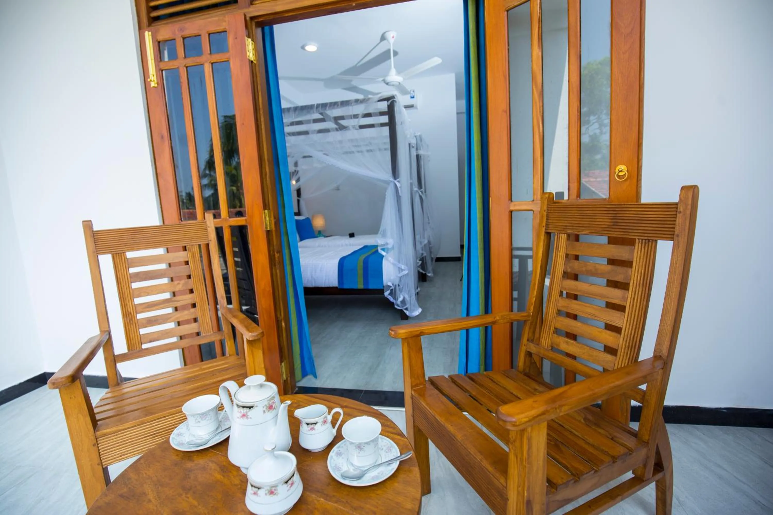 Balcony/Terrace, Bed in Wavelength Hotel & Wellness Center