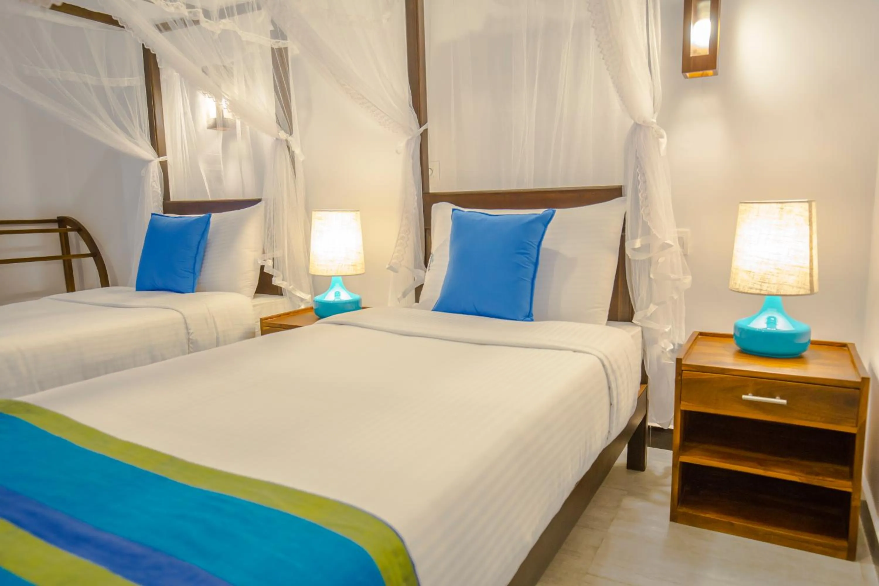 Bed in Wavelength Hotel & Wellness Center