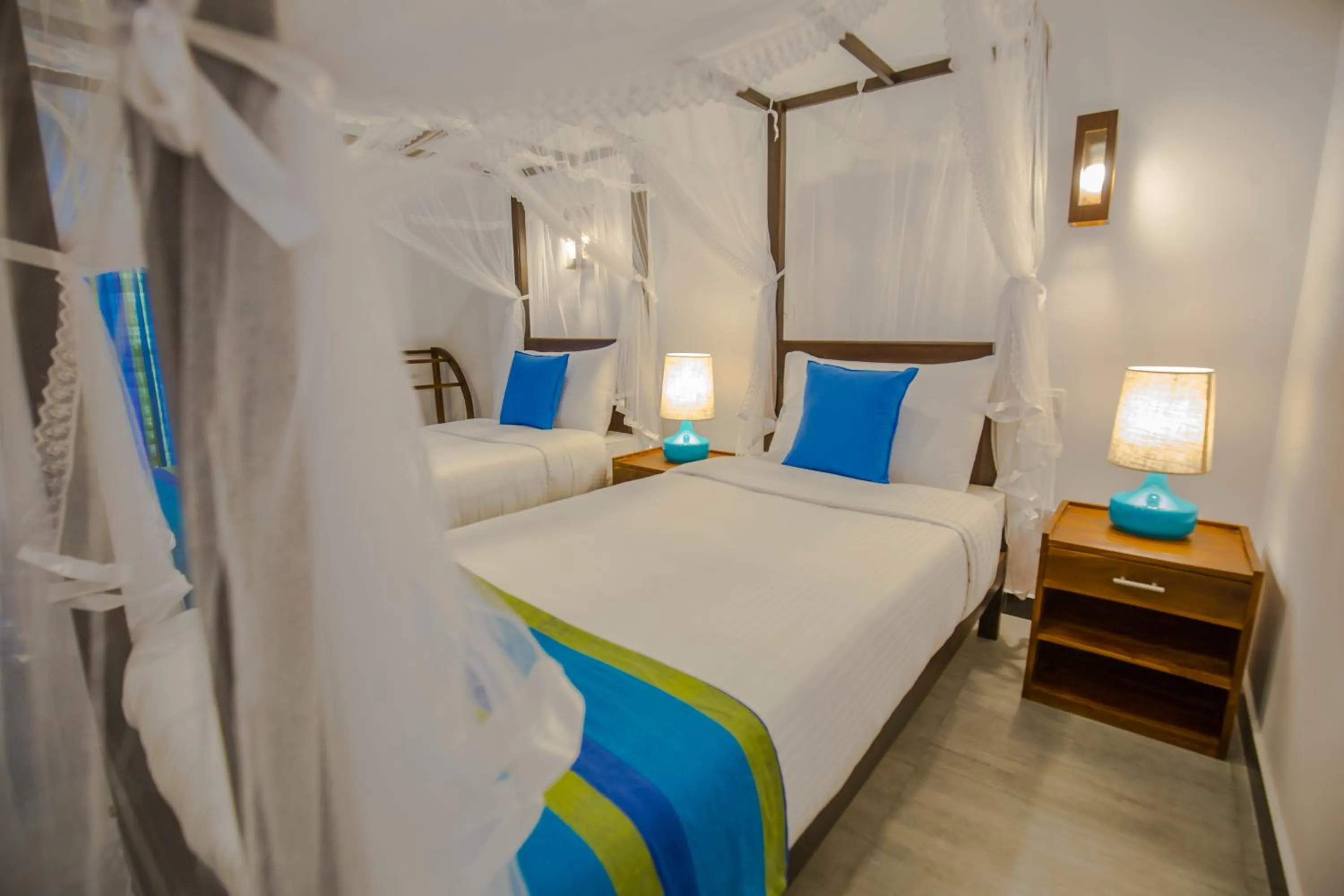 Bed in Wavelength Hotel & Wellness Center