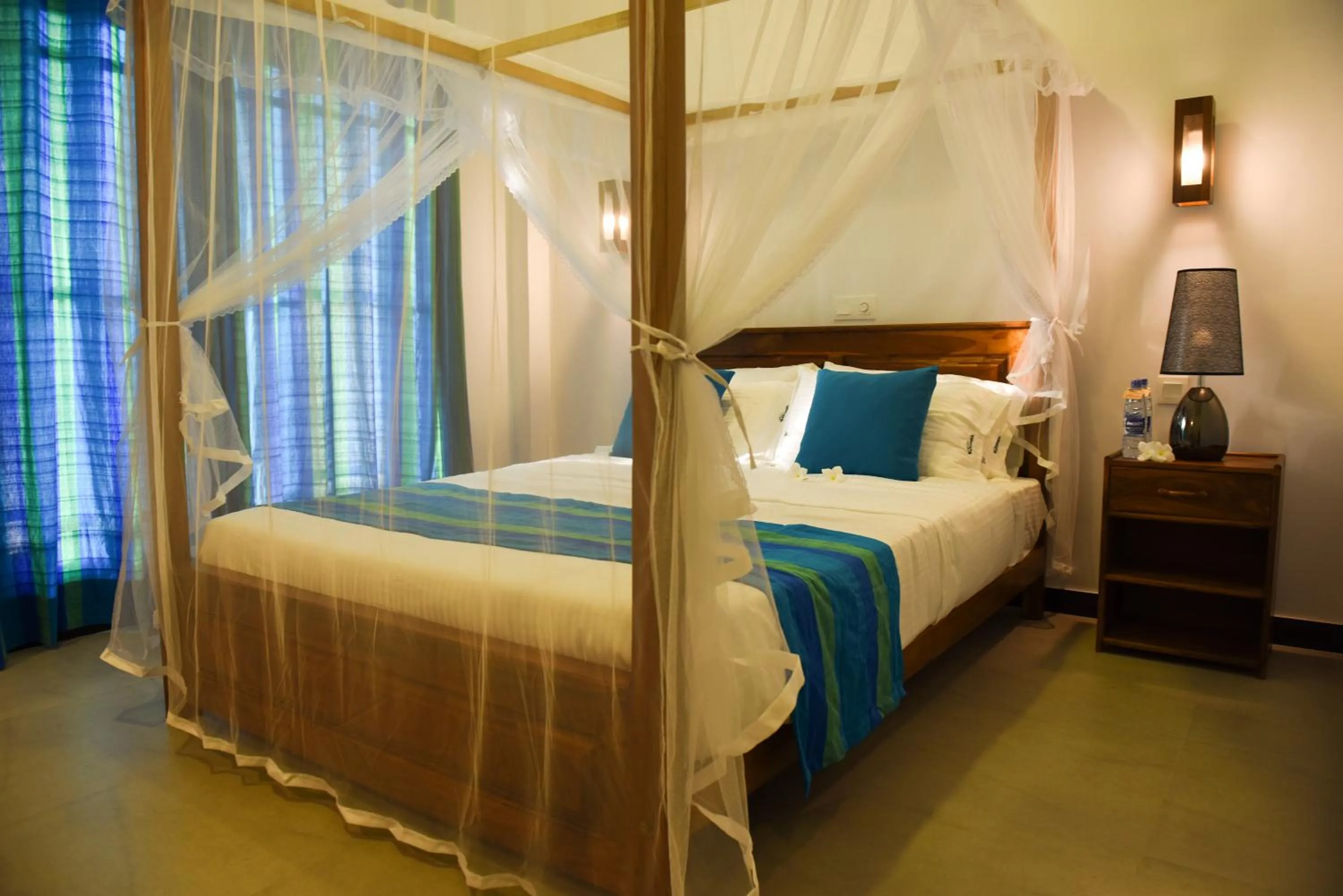 Bed in Wavelength Hotel & Wellness Center