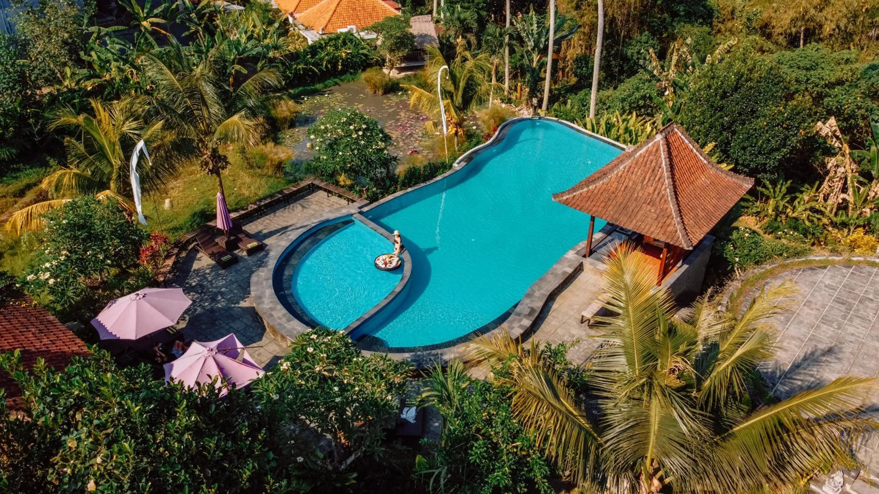 Swimming pool in Uma Dawa Resort and Spa