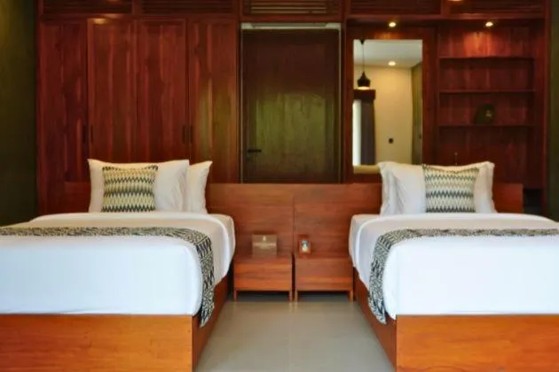 Bedroom, Bed in Uma Dawa Resort and Spa