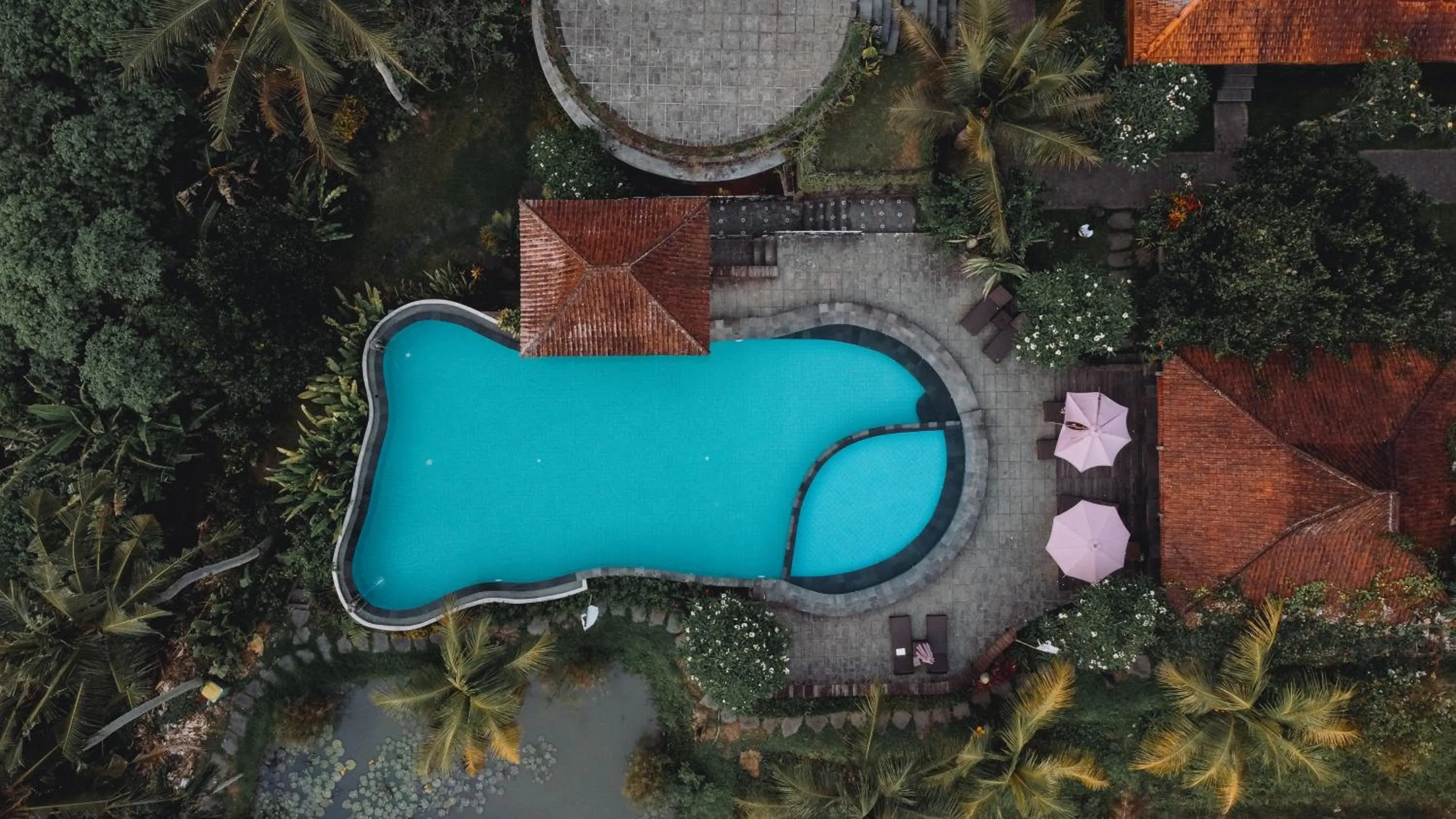 Swimming pool in Uma Dawa Resort and Spa