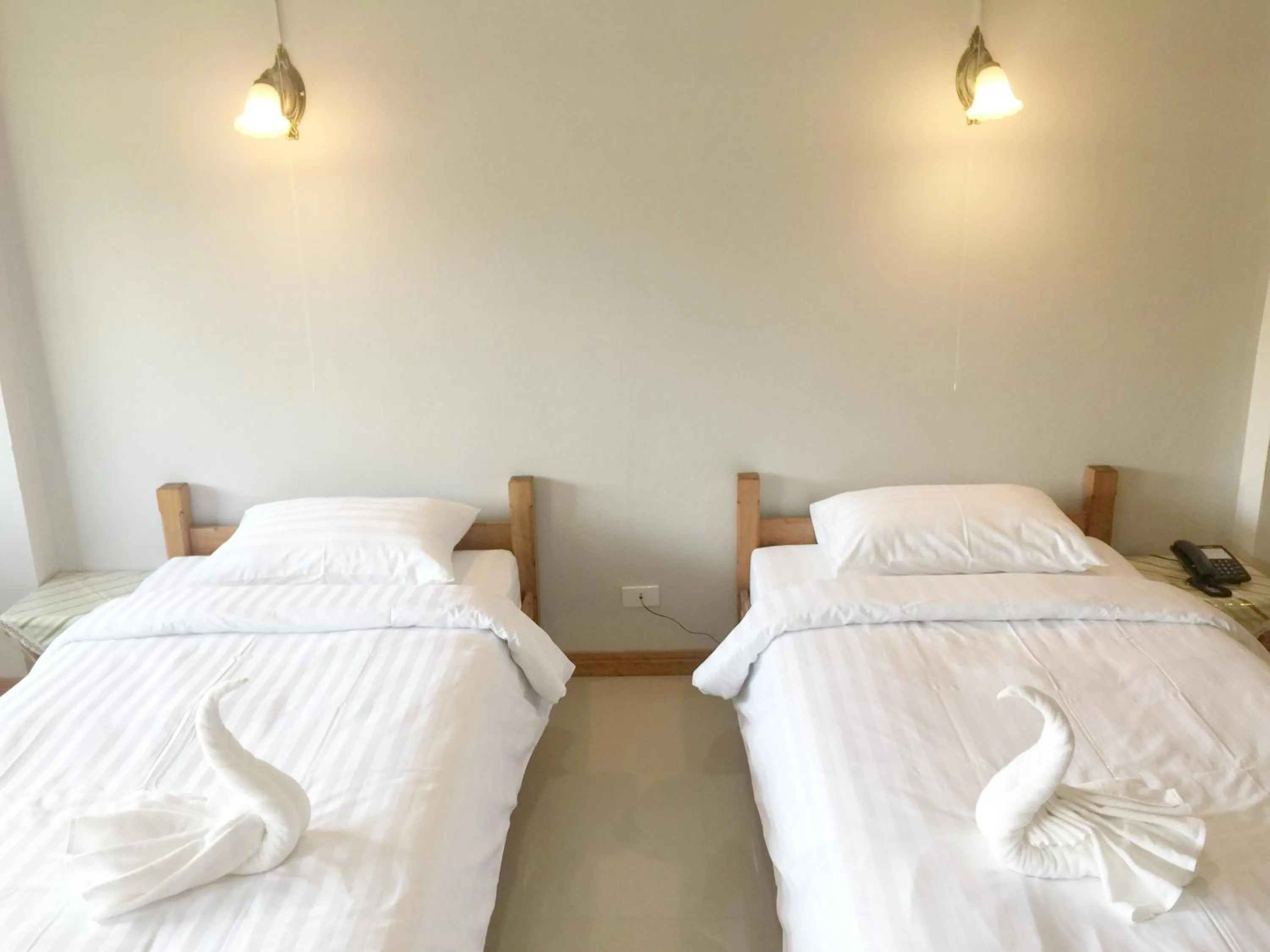 Bed in Baan Bangrak Residence