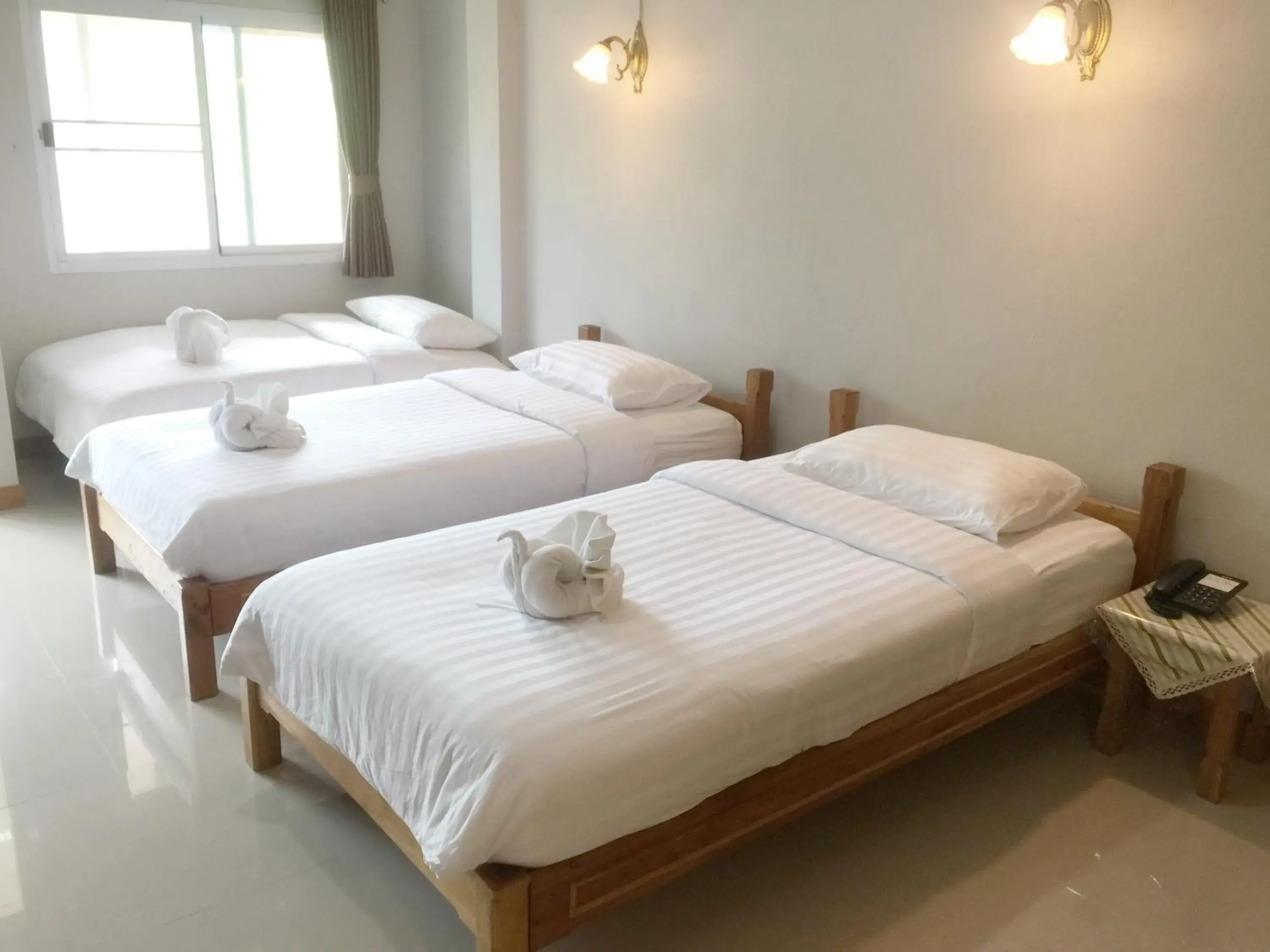 Classic Triple Room in Baan Bangrak Residence Classic Triple Room in Baan Bangrak Residence
