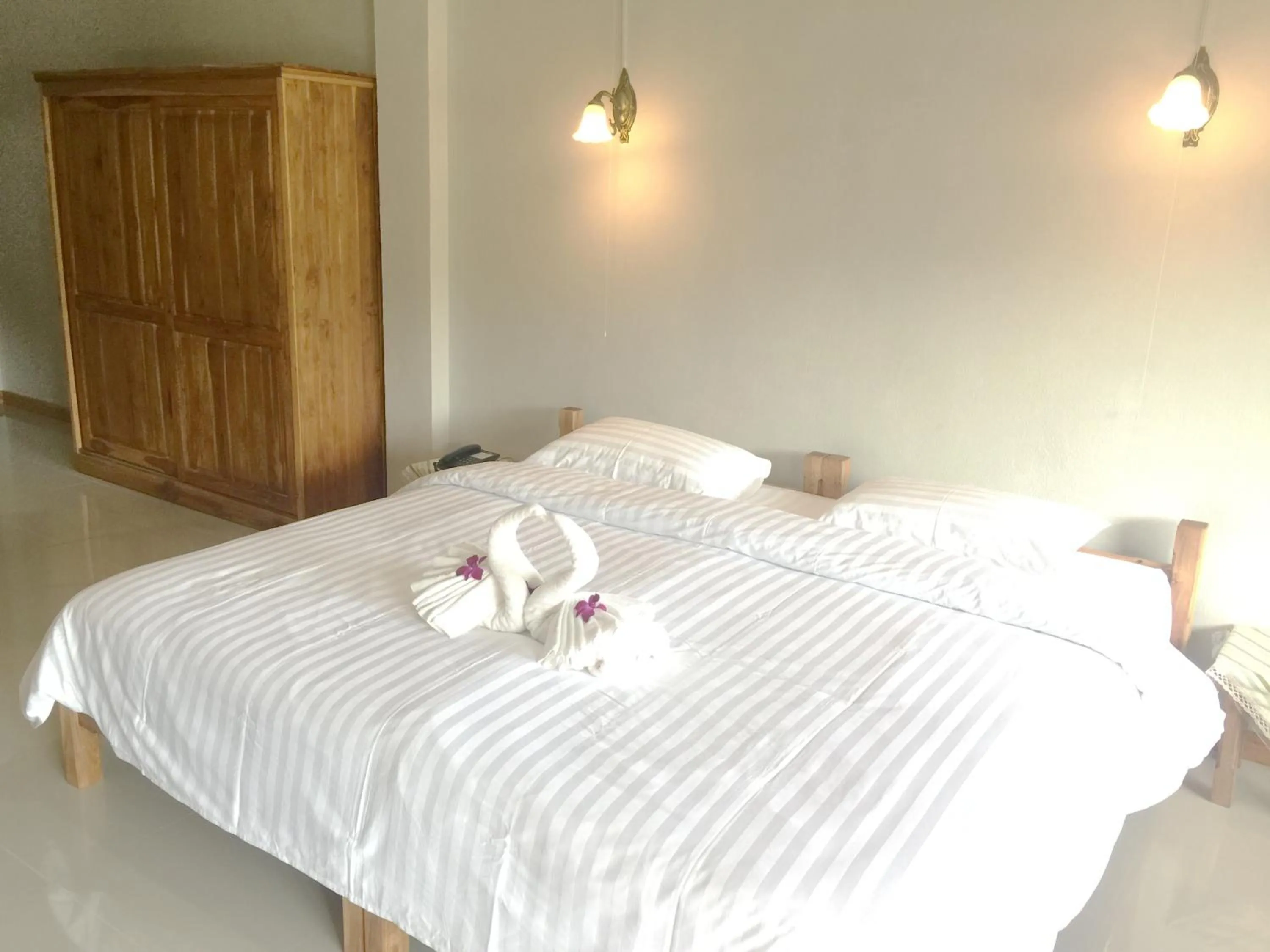 Bed in Baan Bangrak Residence