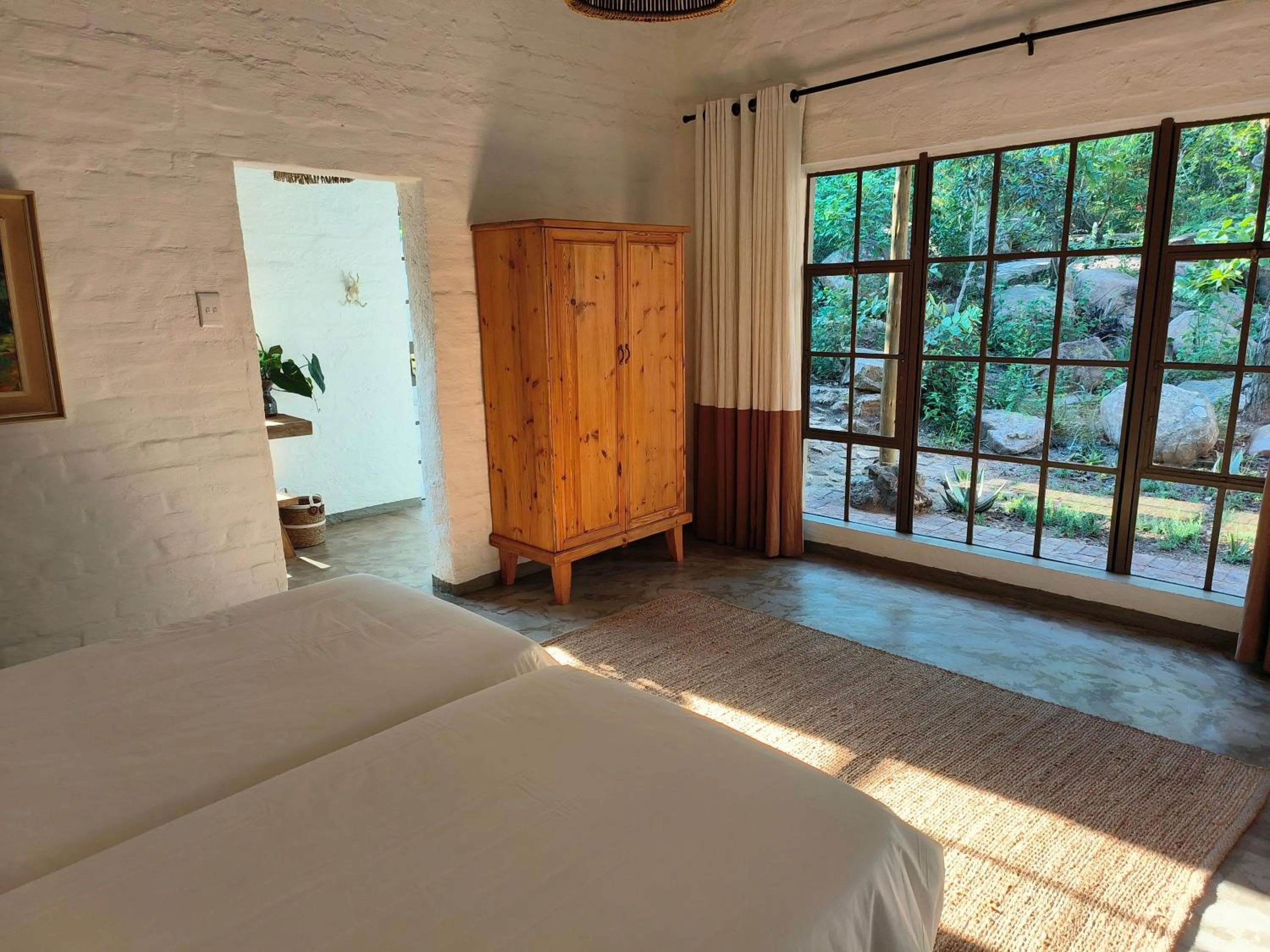 Bed in Eloff Guest House and Gallery