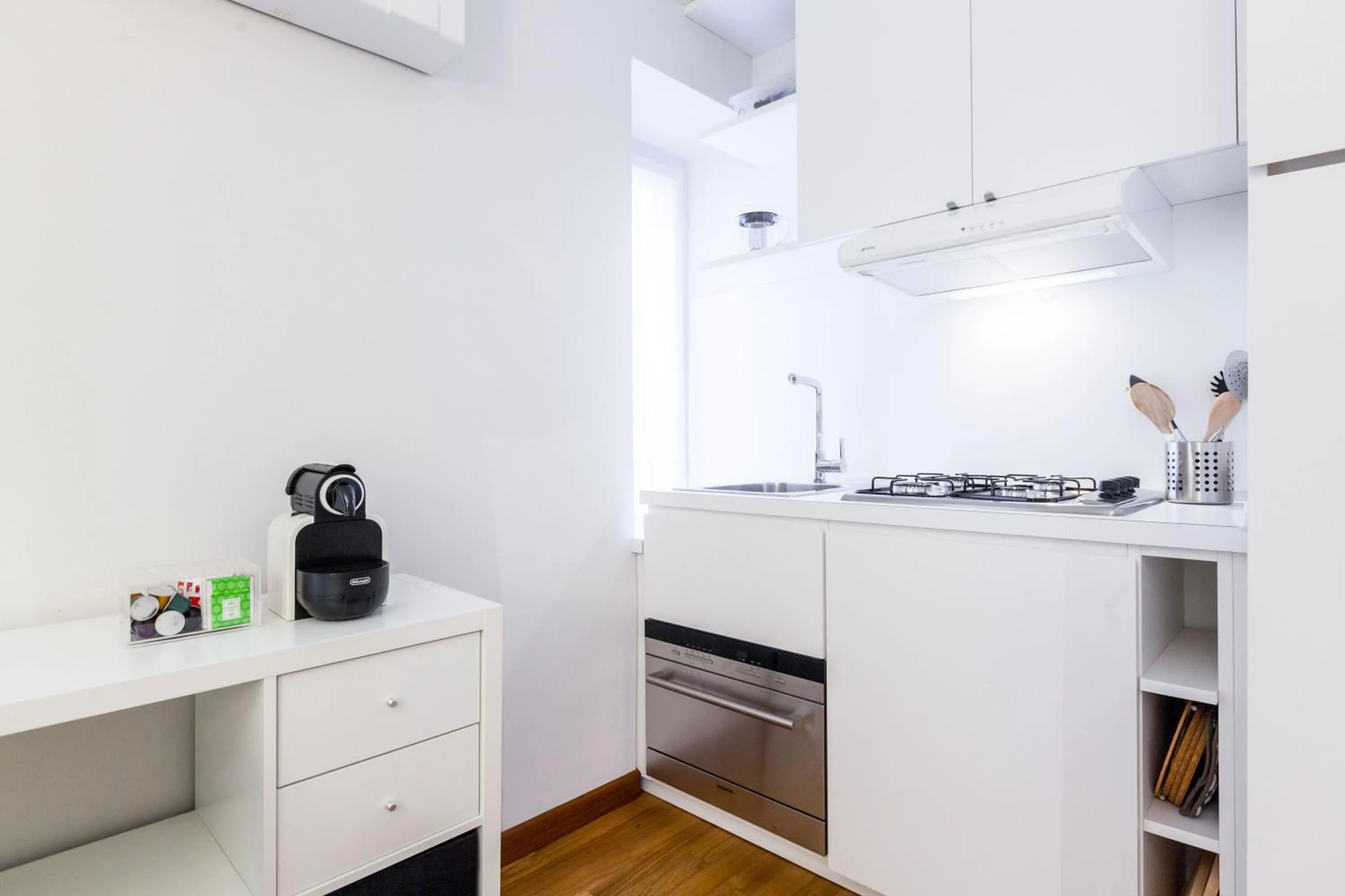 Kitchen or kitchenette in easyhomes - Spiga Suite