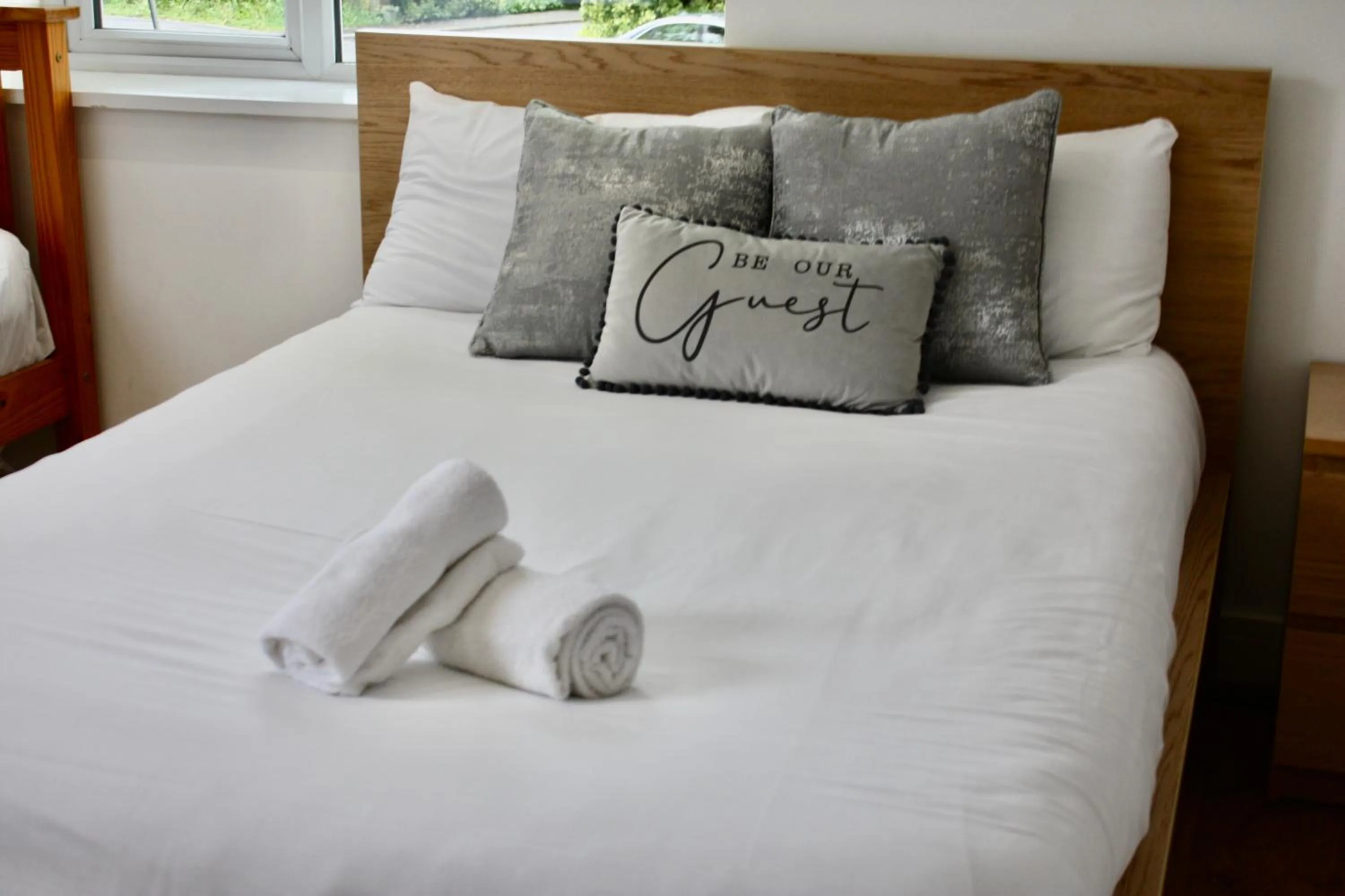 Bed in Four Corners Holiday Home Hot Tub & Sauna