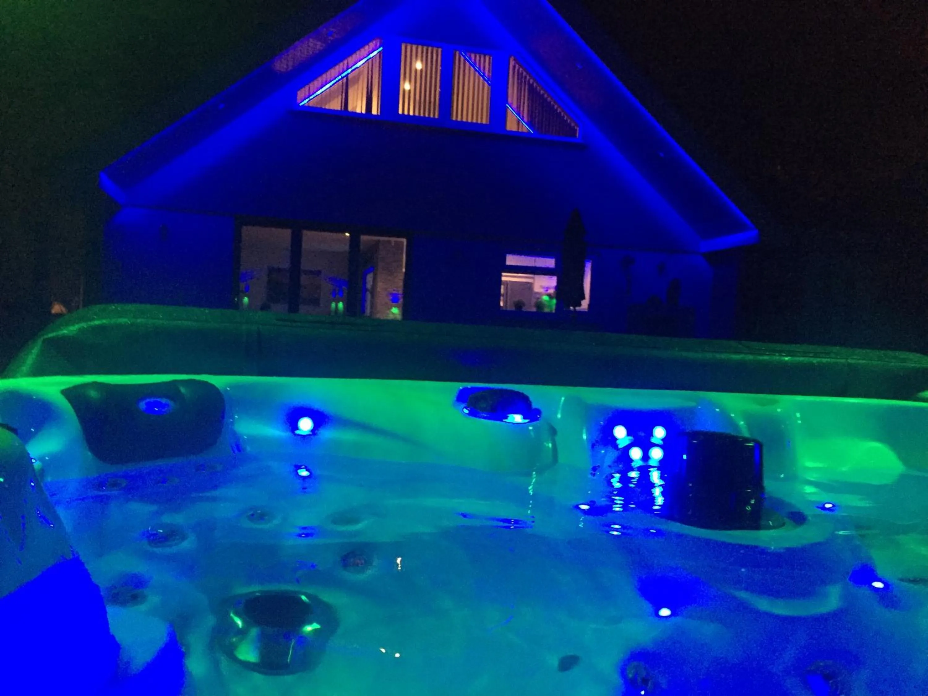 Patio in Four Corners Holiday Home Hot Tub & Sauna