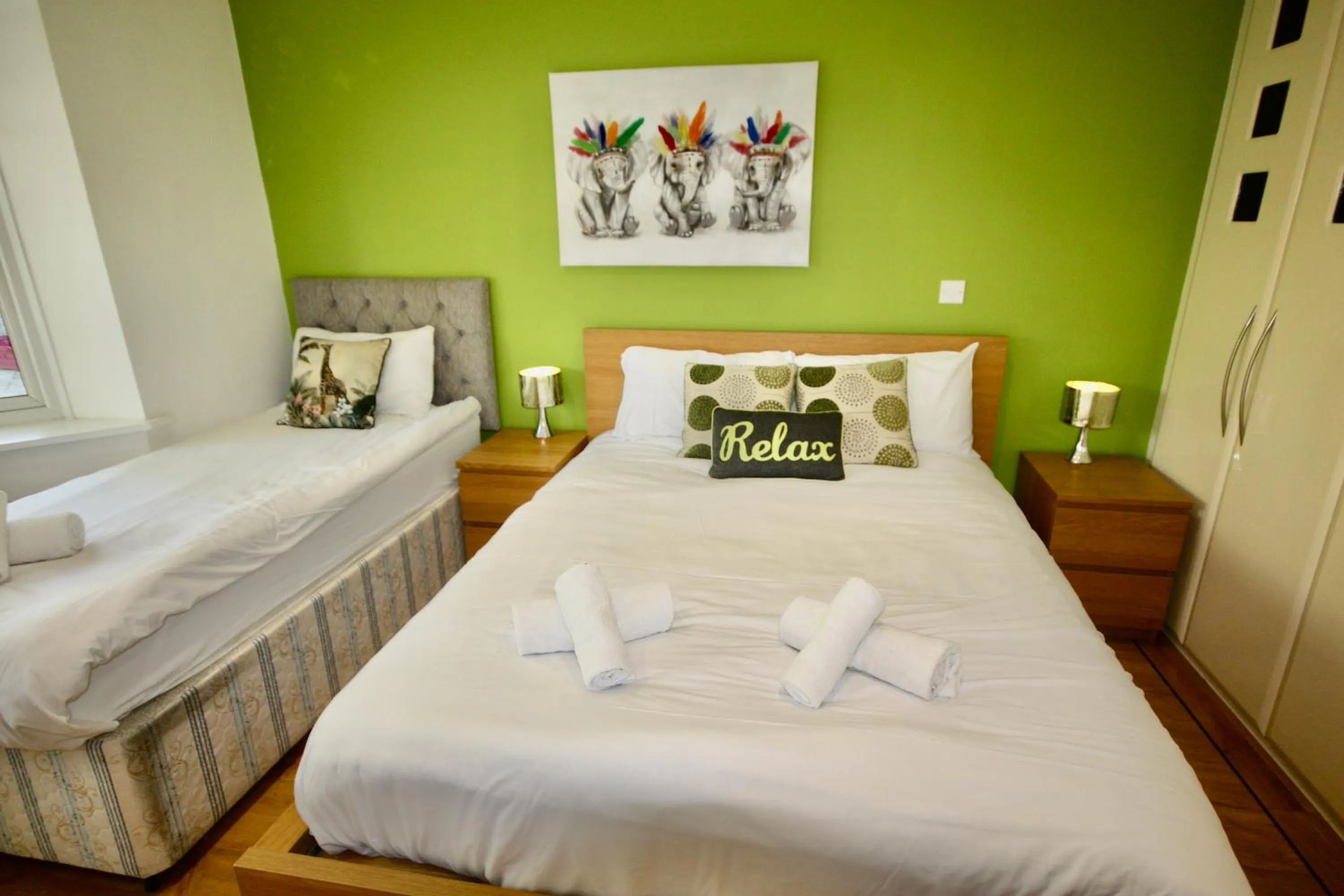 Bed in Four Corners Holiday Home Hot Tub & Sauna