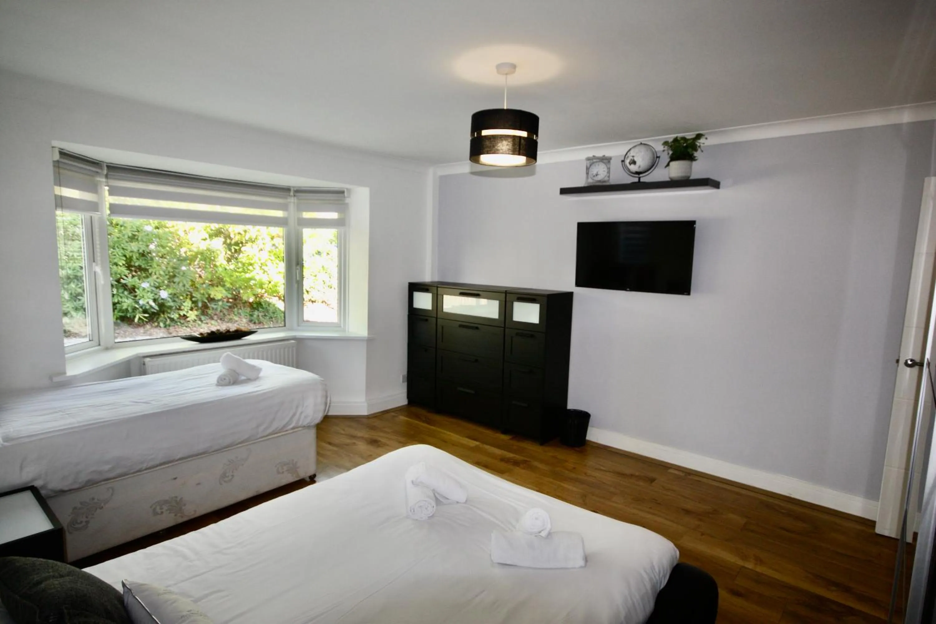 Bed in Four Corners Holiday Home Hot Tub & Sauna