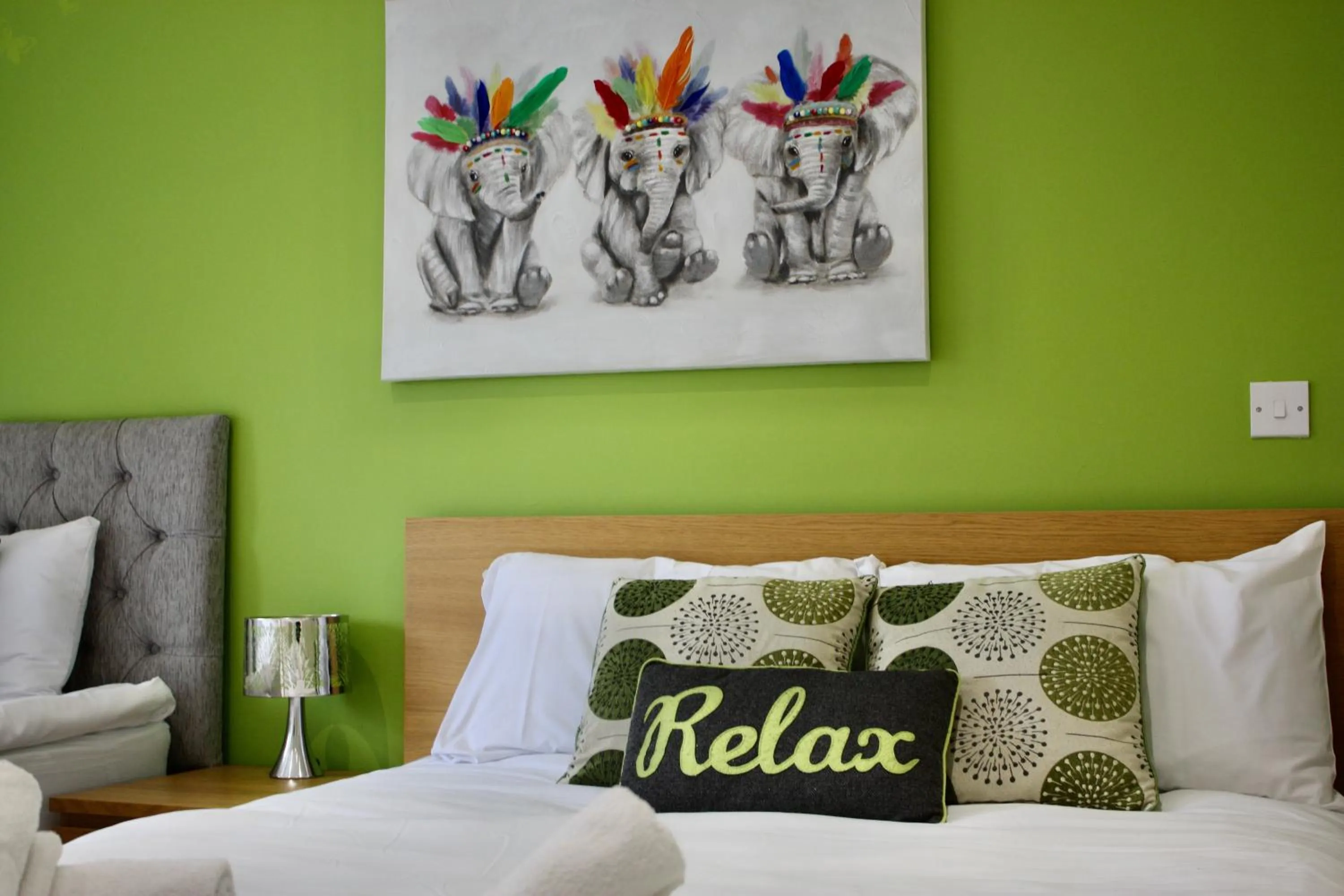 Bed in Four Corners Holiday Home Hot Tub & Sauna