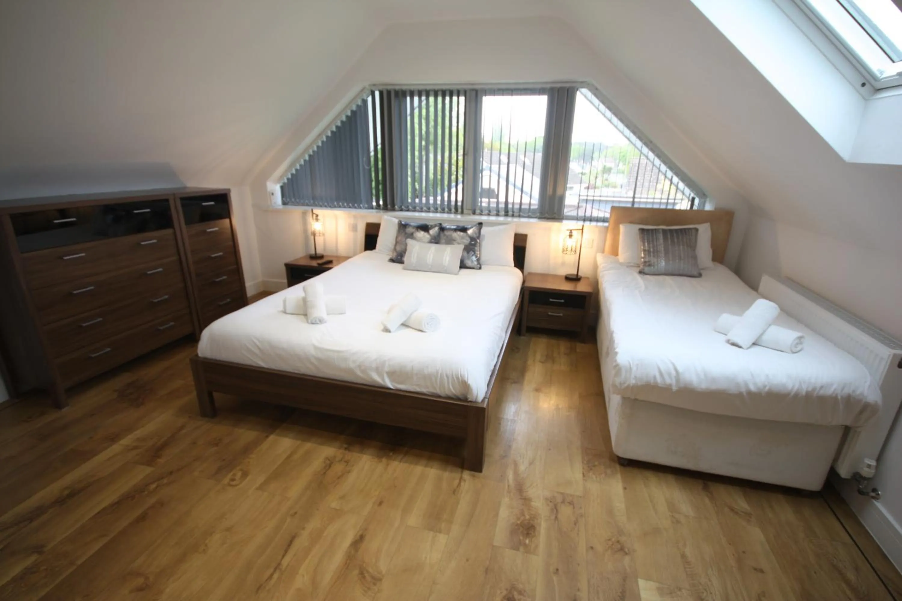 Bed in Four Corners Holiday Home Hot Tub & Sauna