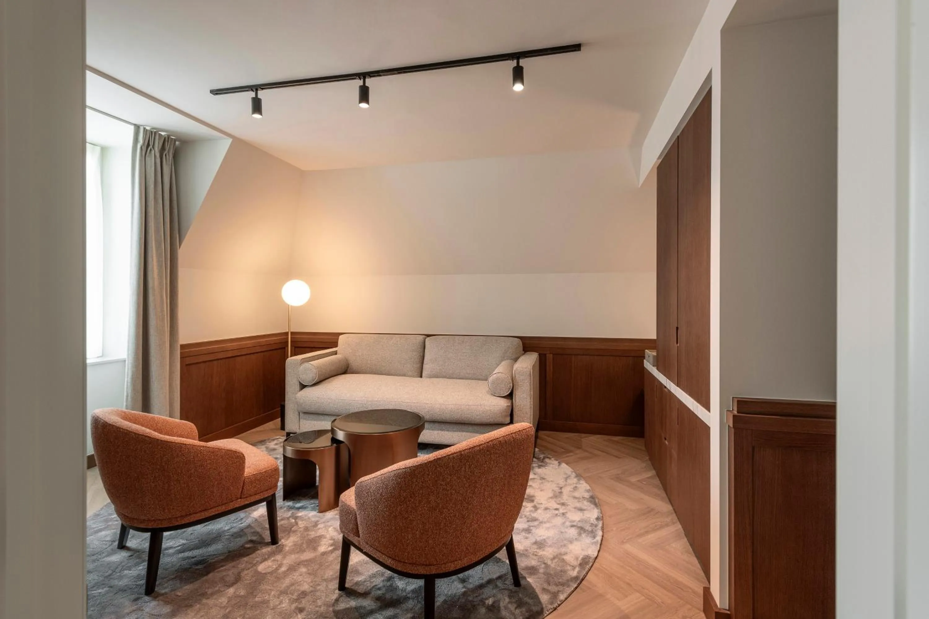 Living room in Dukes' Palace Brugge - by Dukes' Hotel Collection