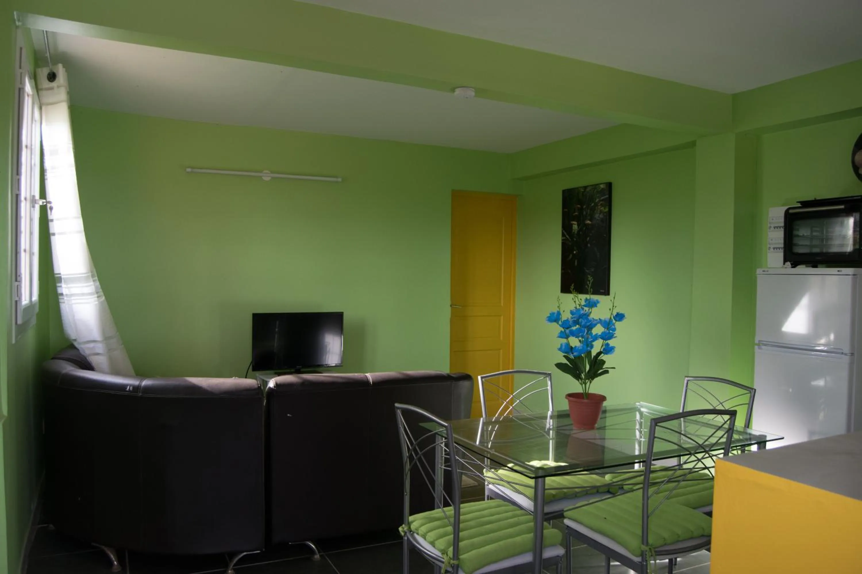 Communal lounge/ TV room in Domaine De Titine