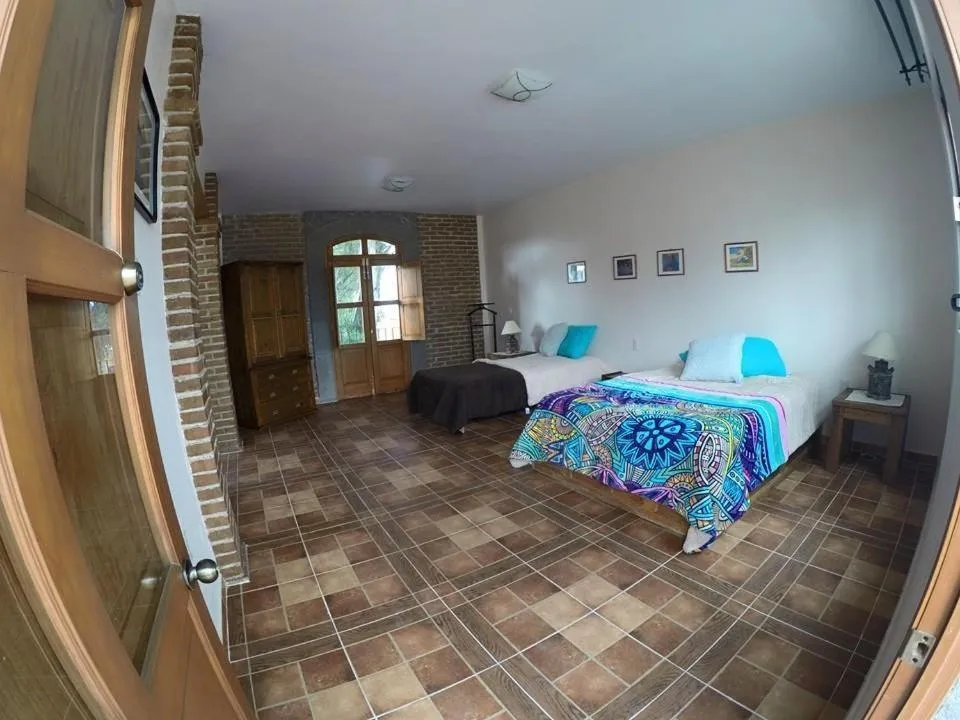 Photo of the whole room, Bed in Hostal el Dulce Nombre