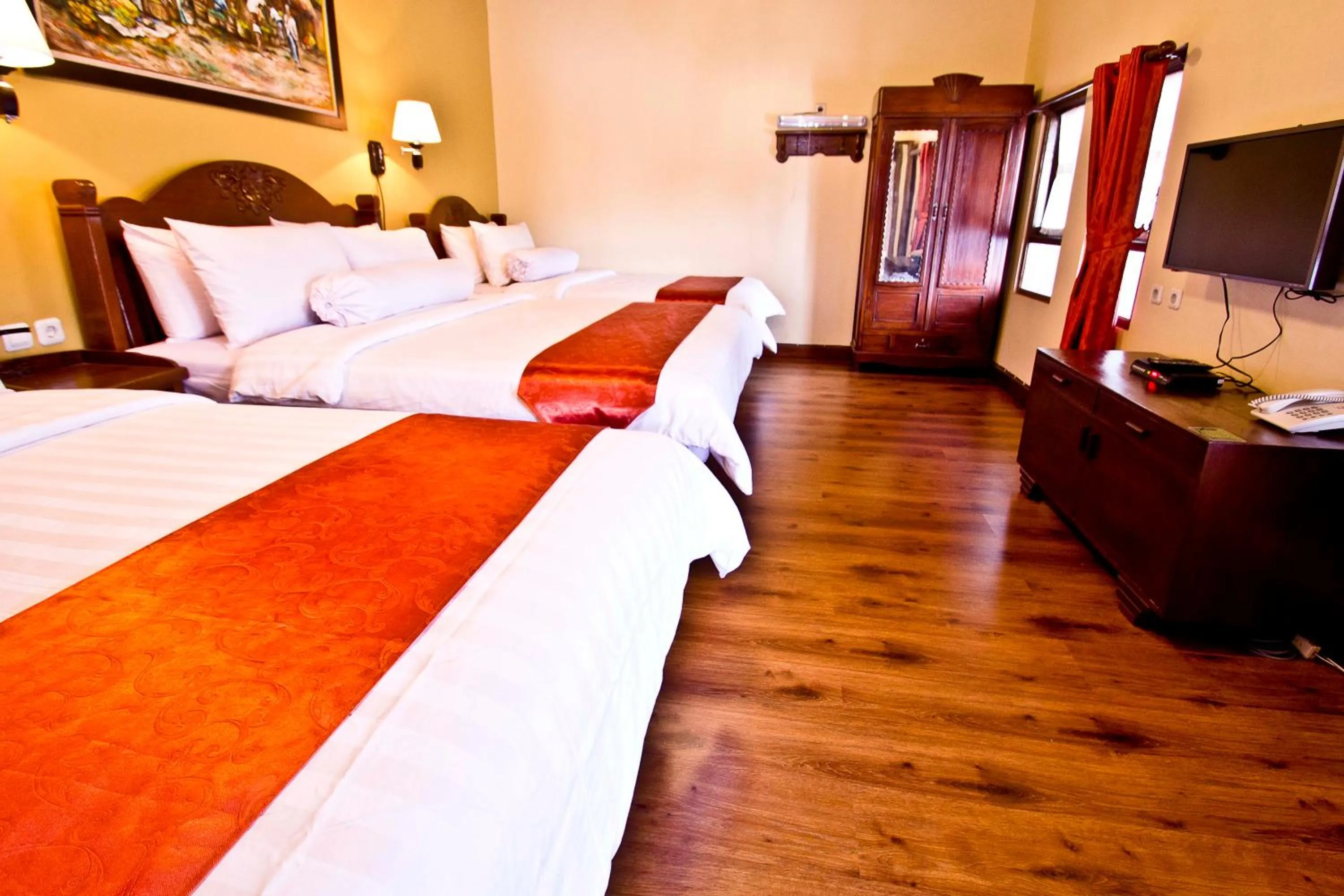 Bed in Puri Sakanti Nature Family Resort