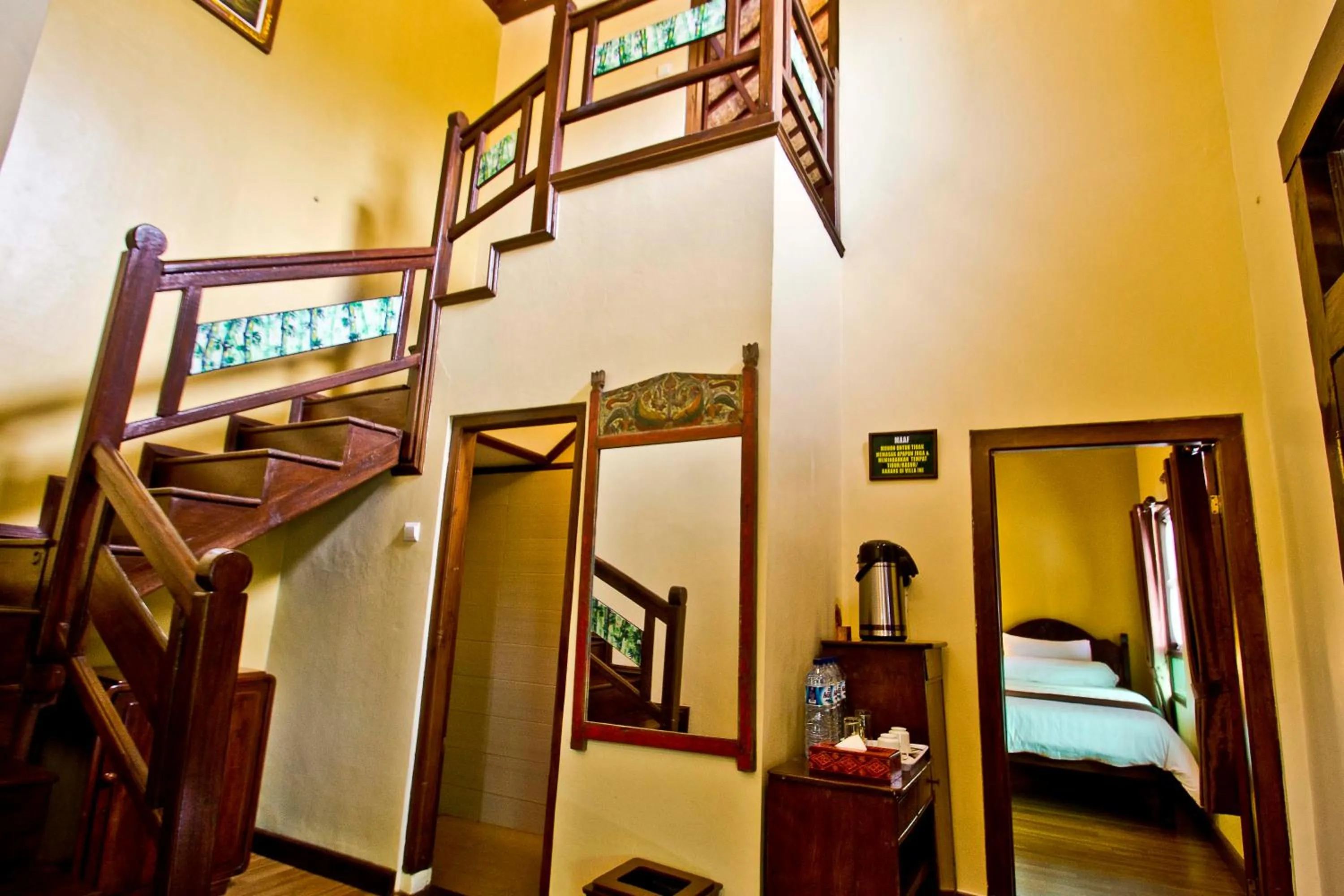 Bed in Puri Sakanti Nature Family Resort