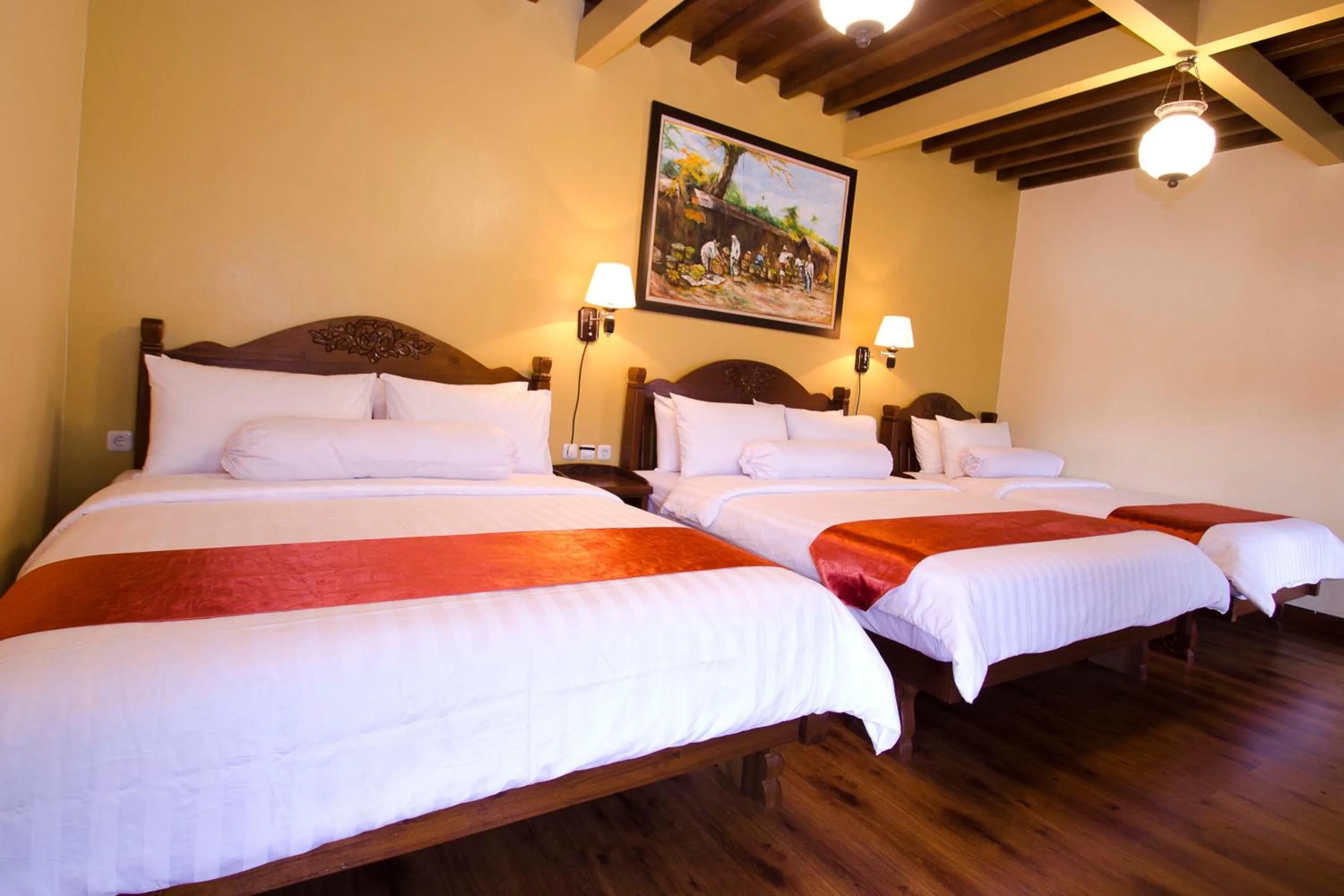 Bed in Puri Sakanti Nature Family Resort