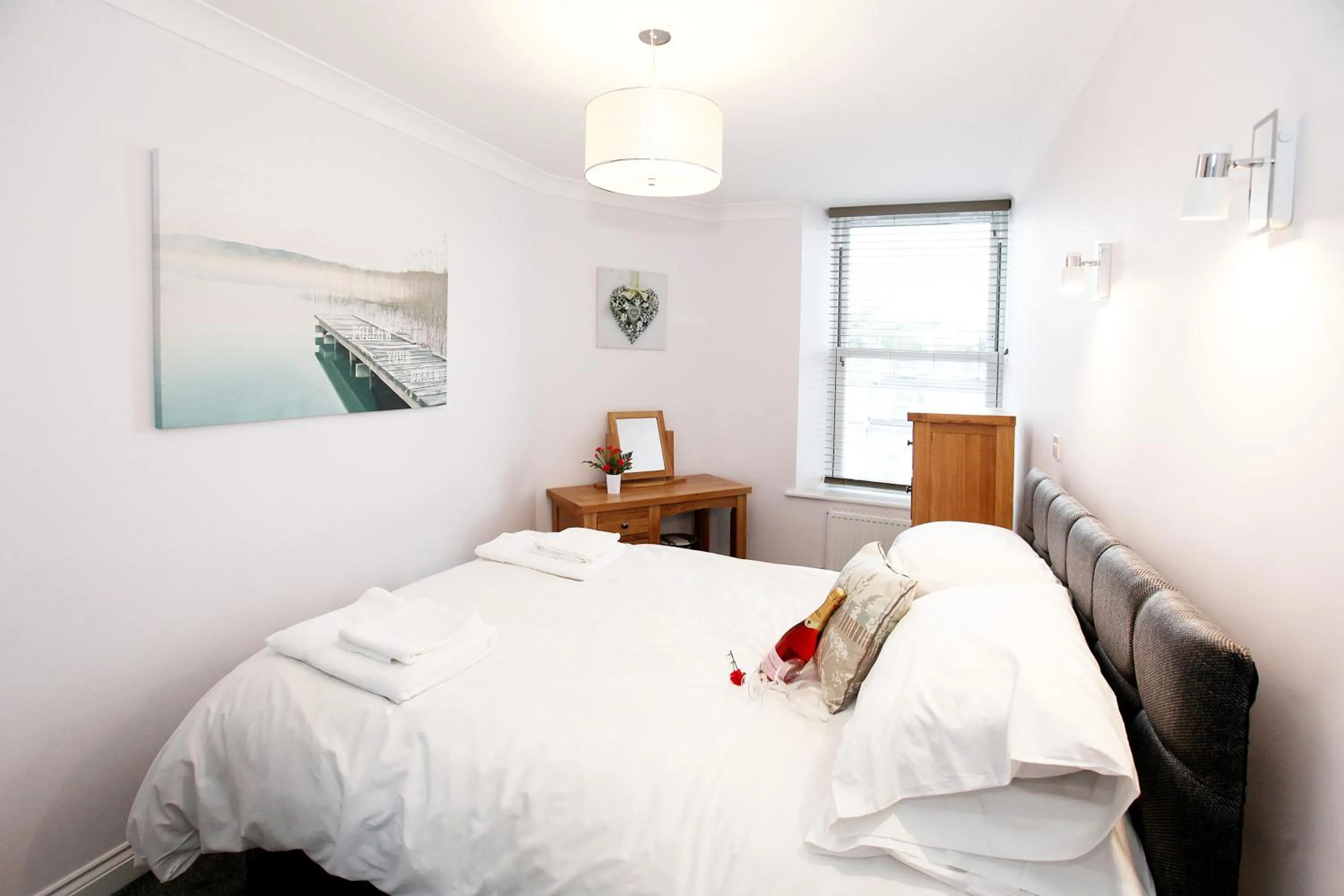 Bed in Austens Apartments