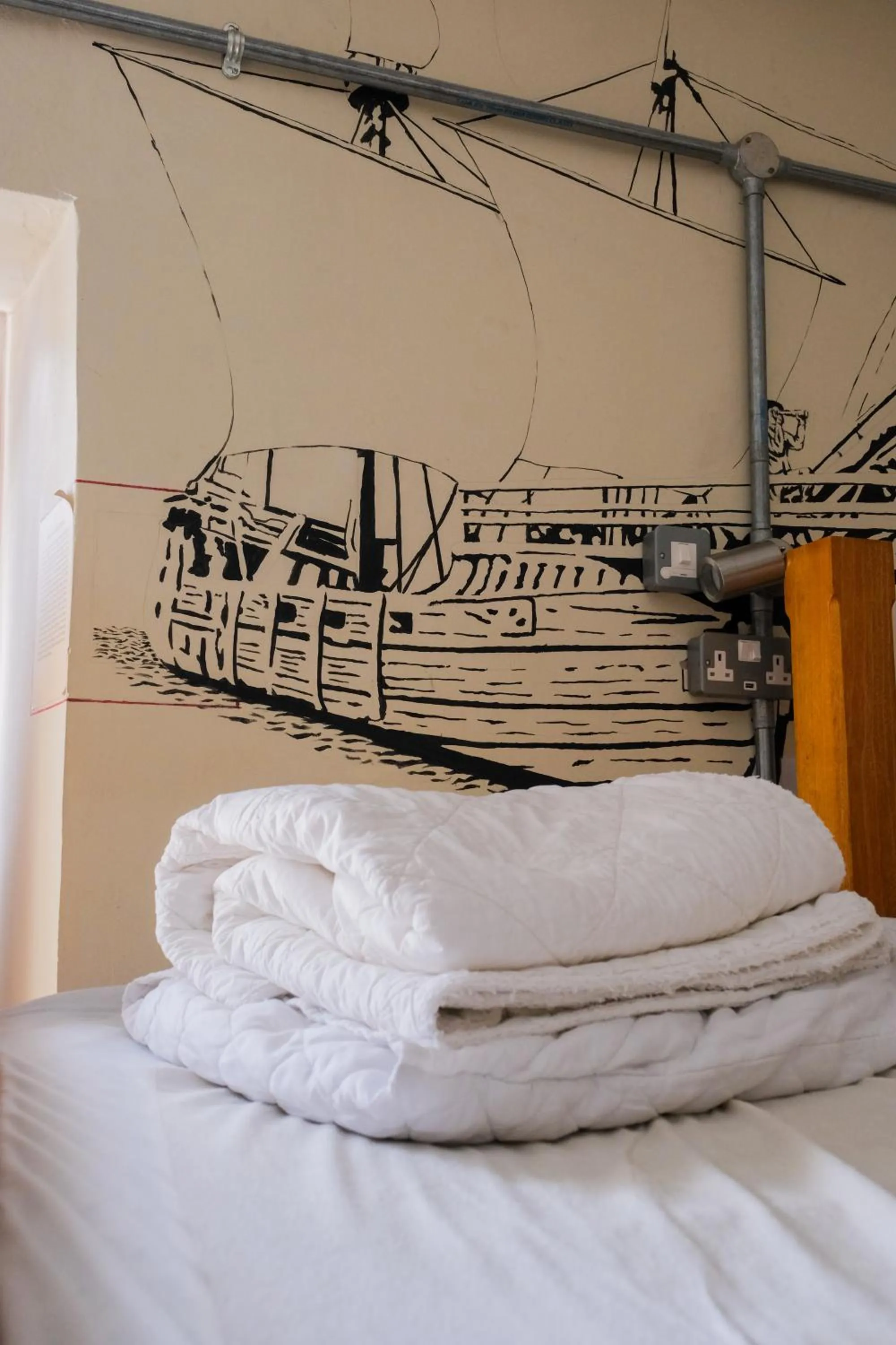 Bed in The Full Moon Backpackers