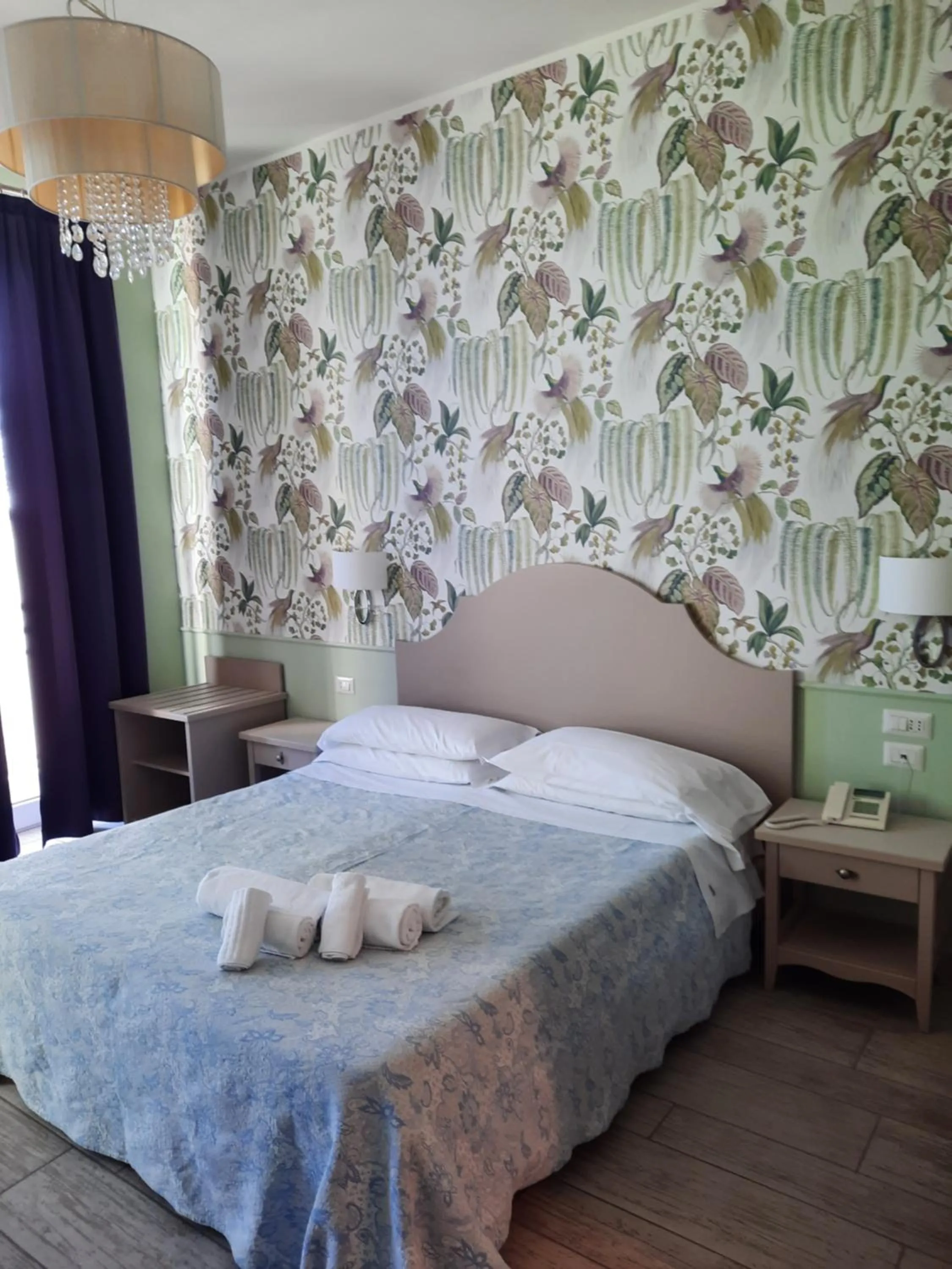 Bed in Hotel Eden Alaxi Hotels