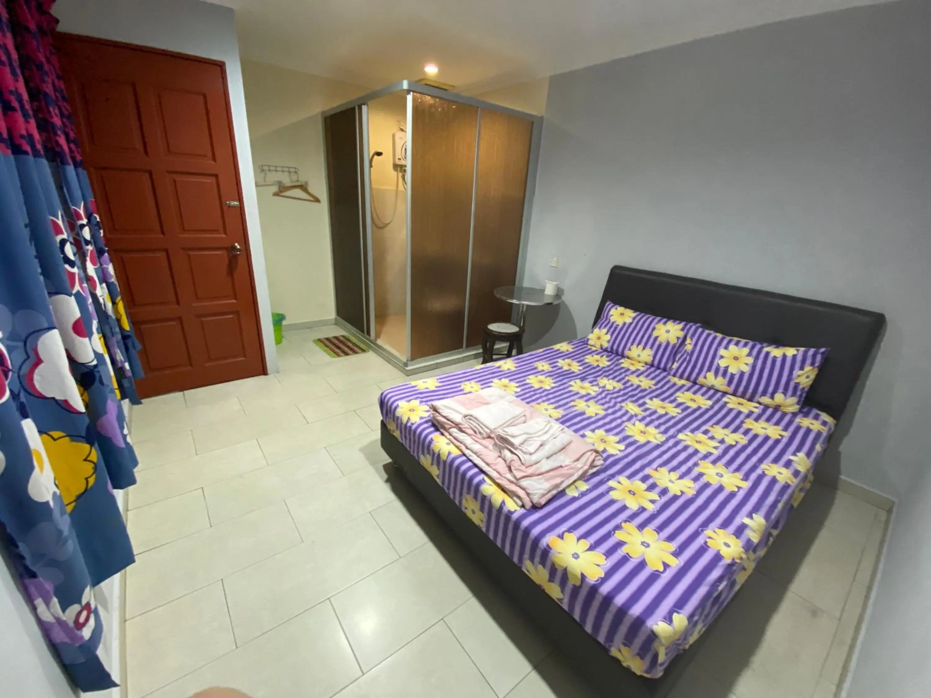 Photo of the whole room, Bed in YY Residences