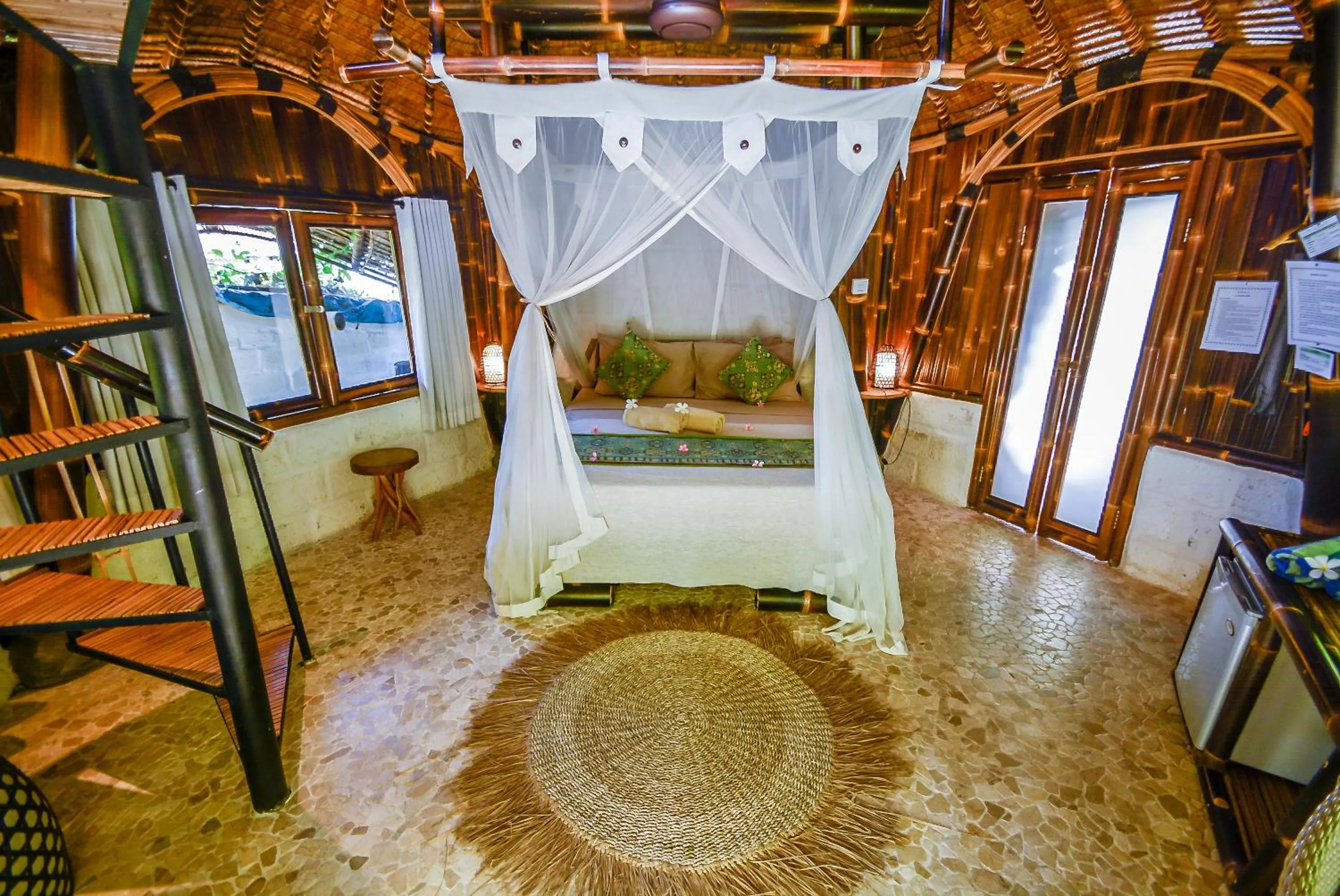 Bed in Le Bamboo Bali