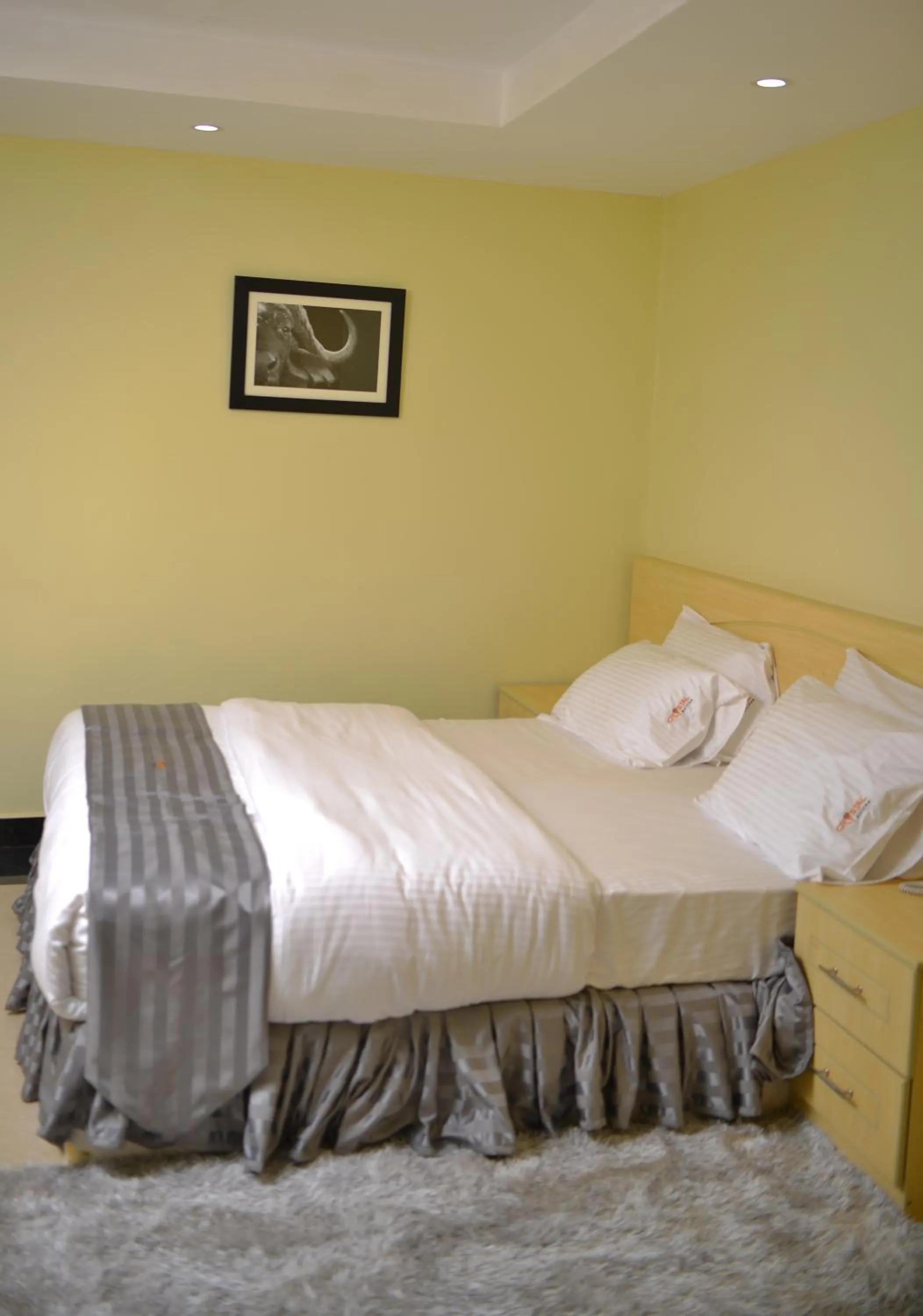 Bed in Crystal Suites & Apartments