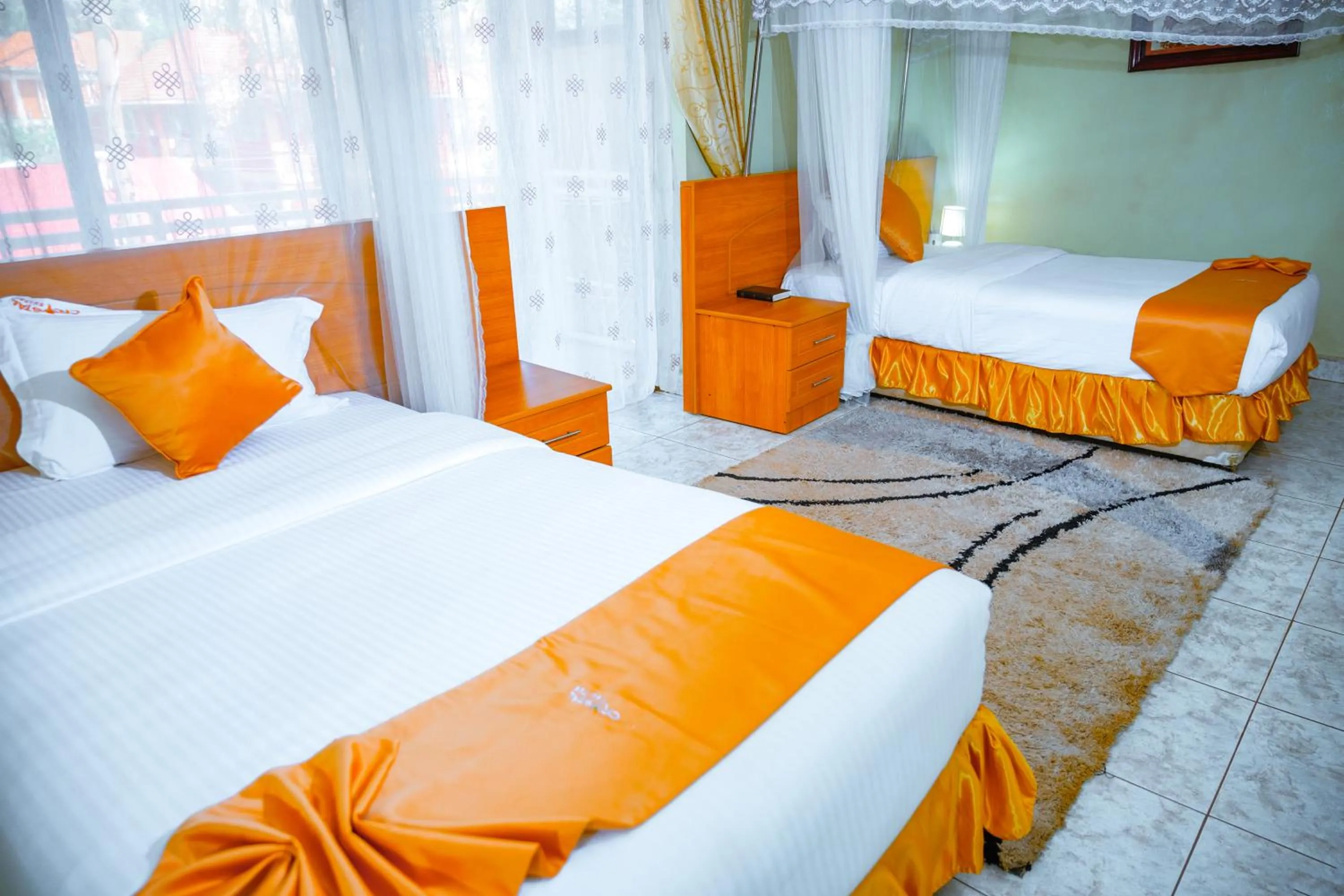 Bed in Crystal Suites & Apartments