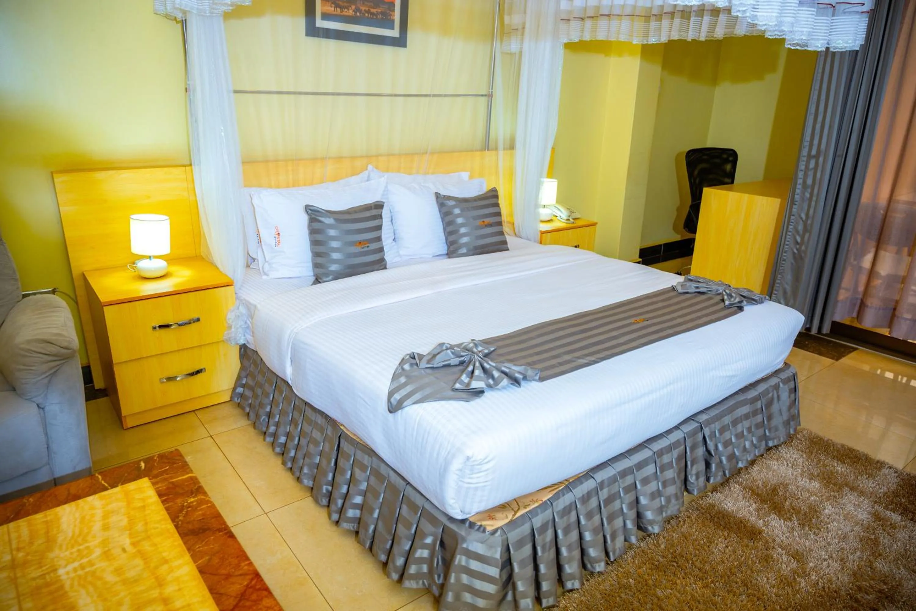 Bed in Crystal Suites & Apartments