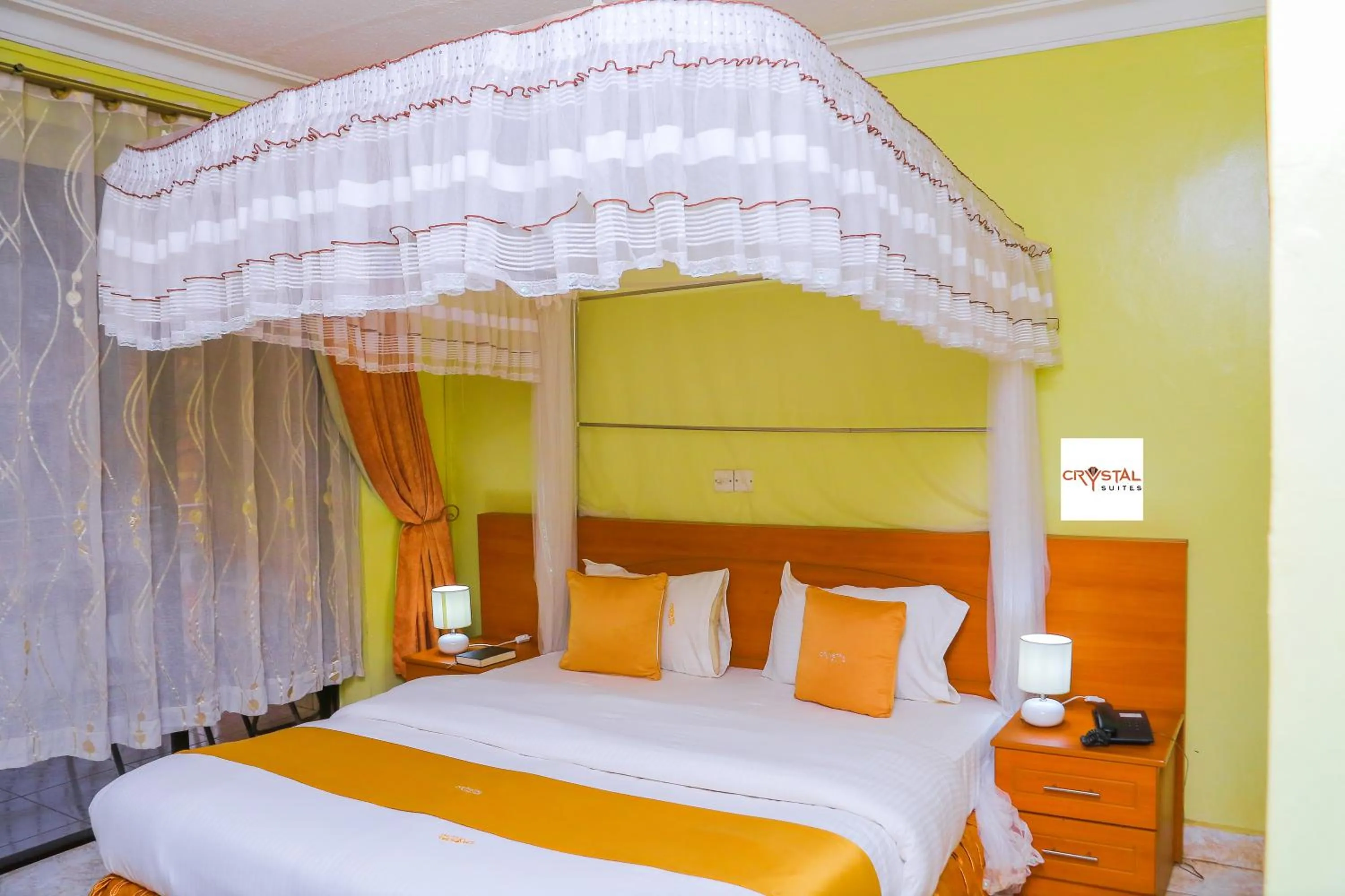 Bed in Crystal Suites & Apartments