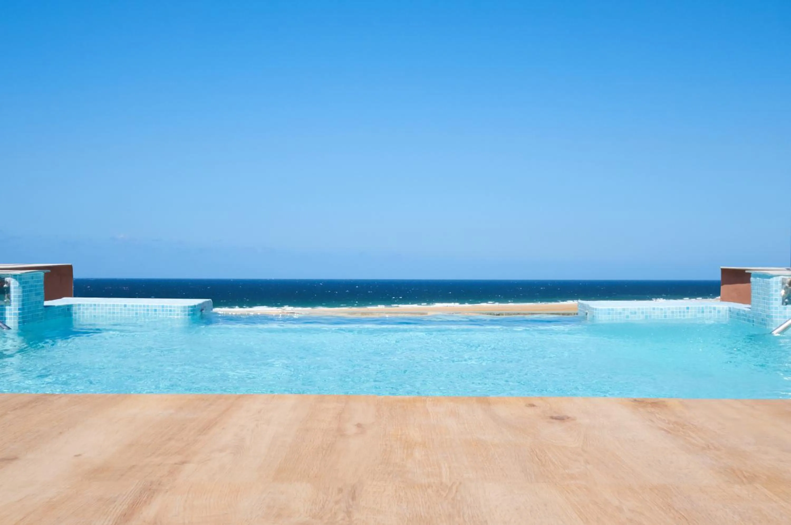 Pool view in Tarifa Lances by QHotels