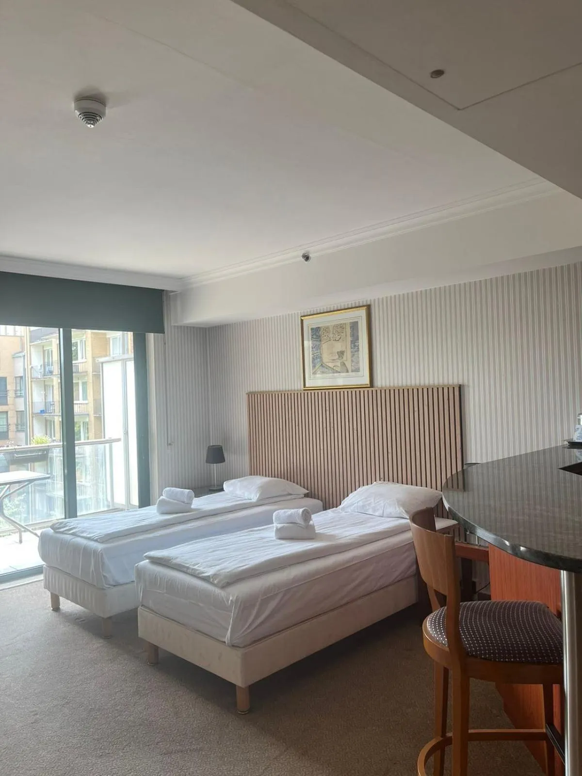 Bed in B-aparthotel Ambiorix