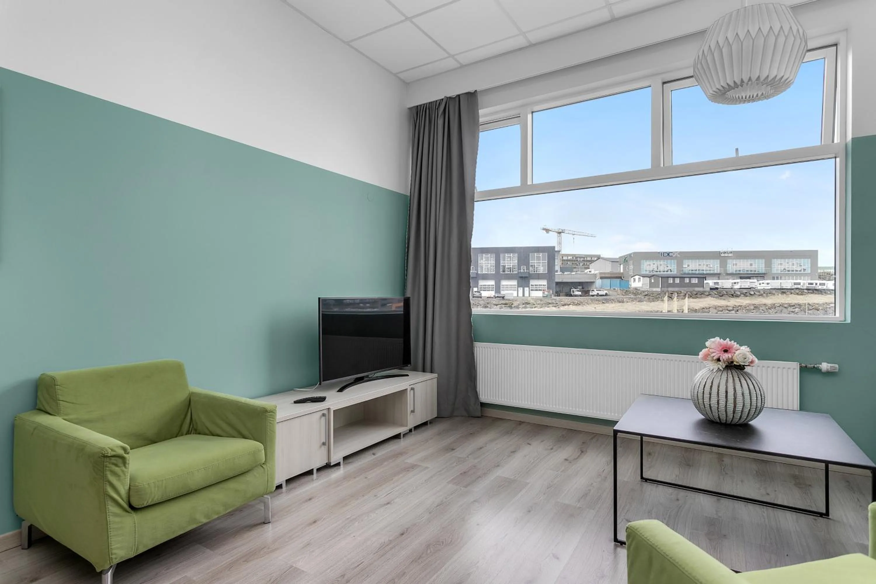 Communal lounge/ TV room in Icelandic Apartments by Heimaleiga