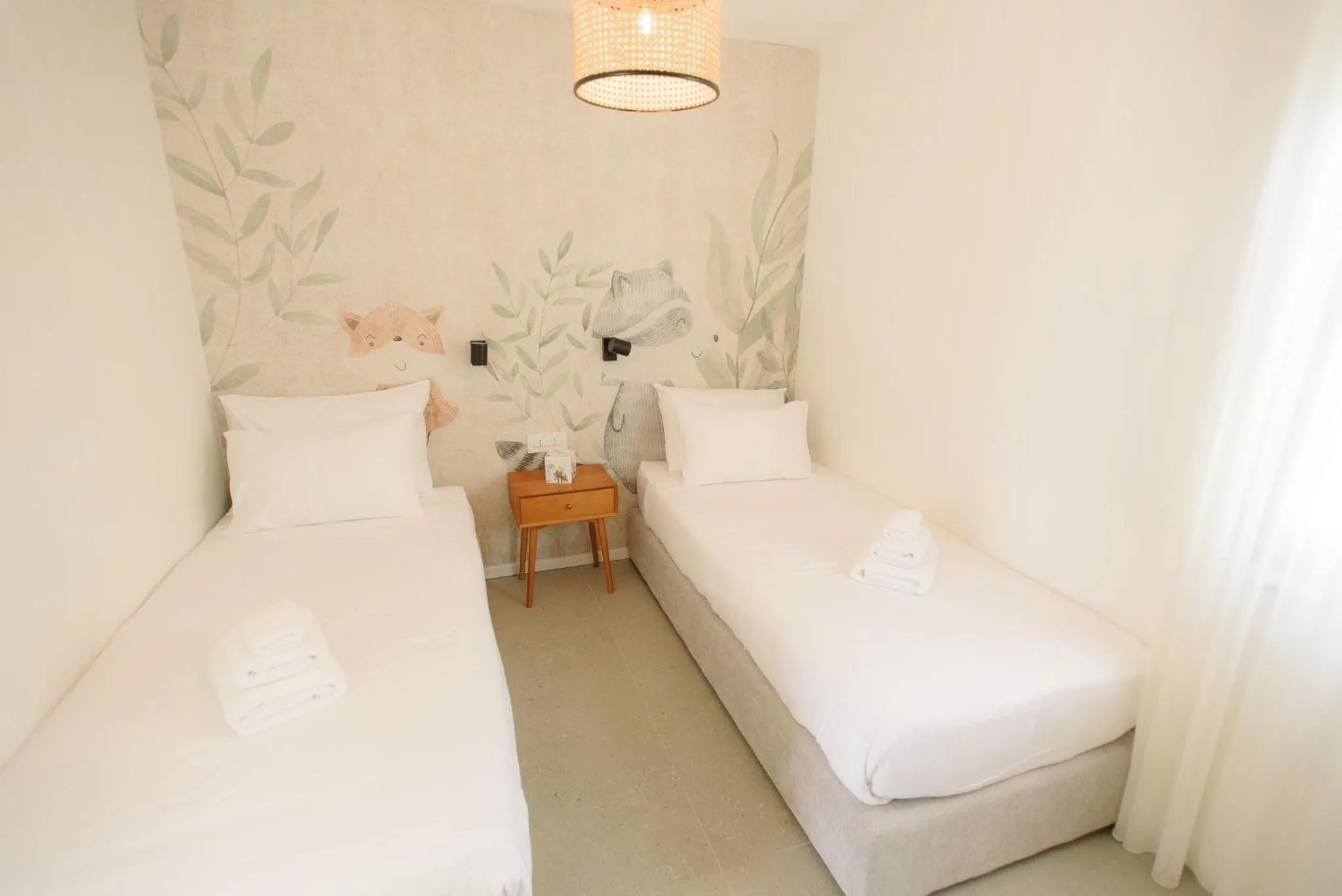 Bed in Family Resort Urania