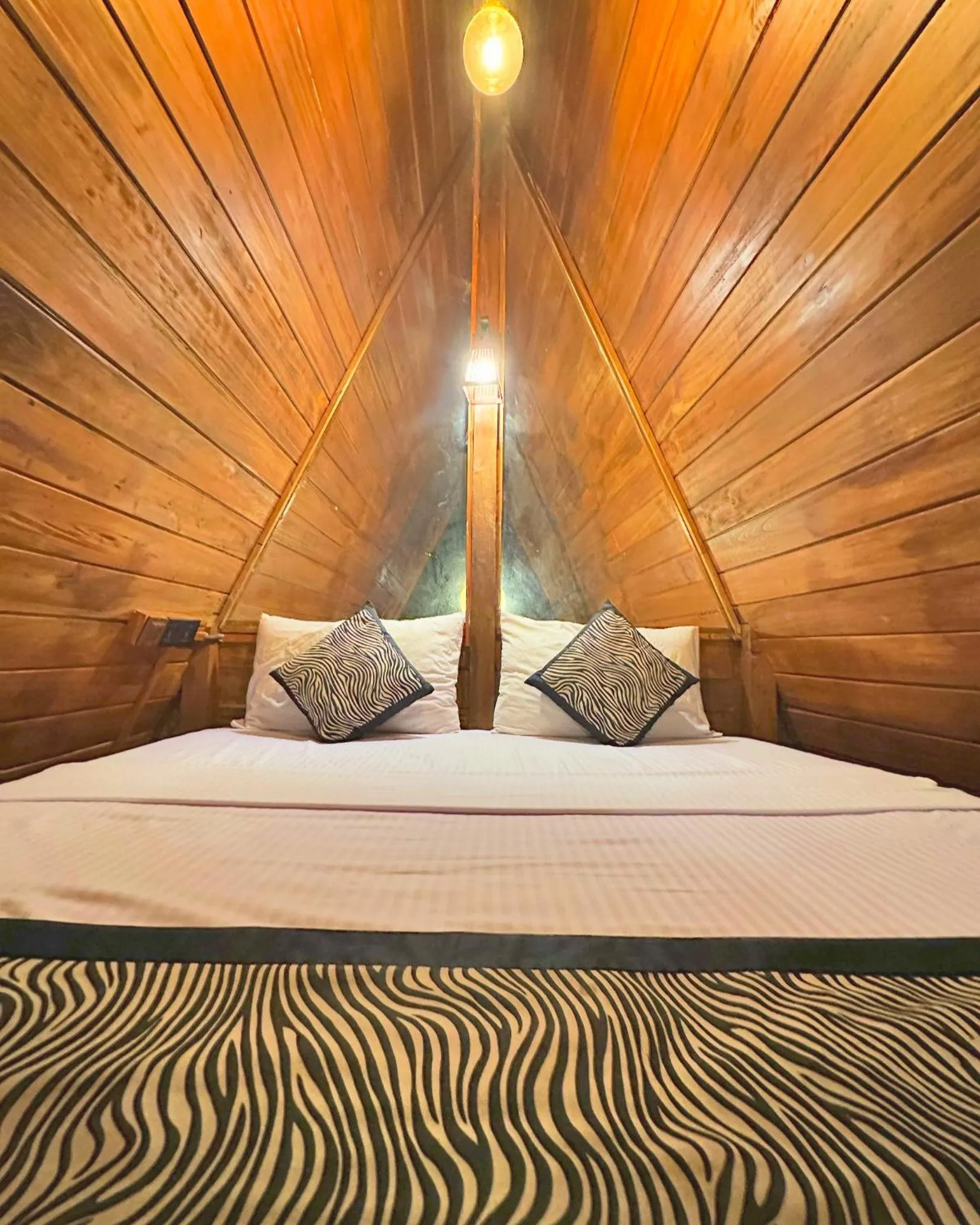 Bed in Levona Garden Resort