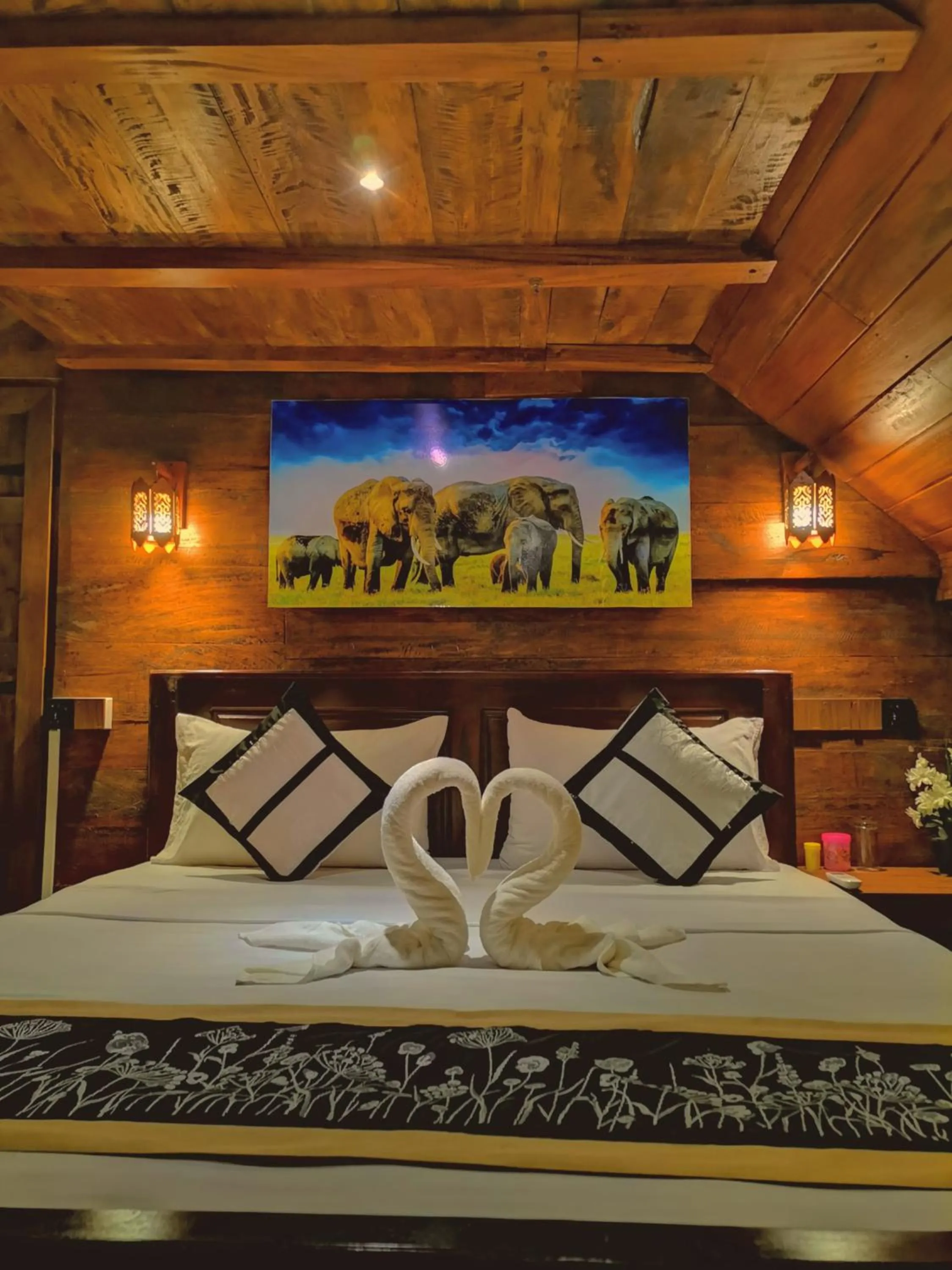 Bed in Levona Garden Resort