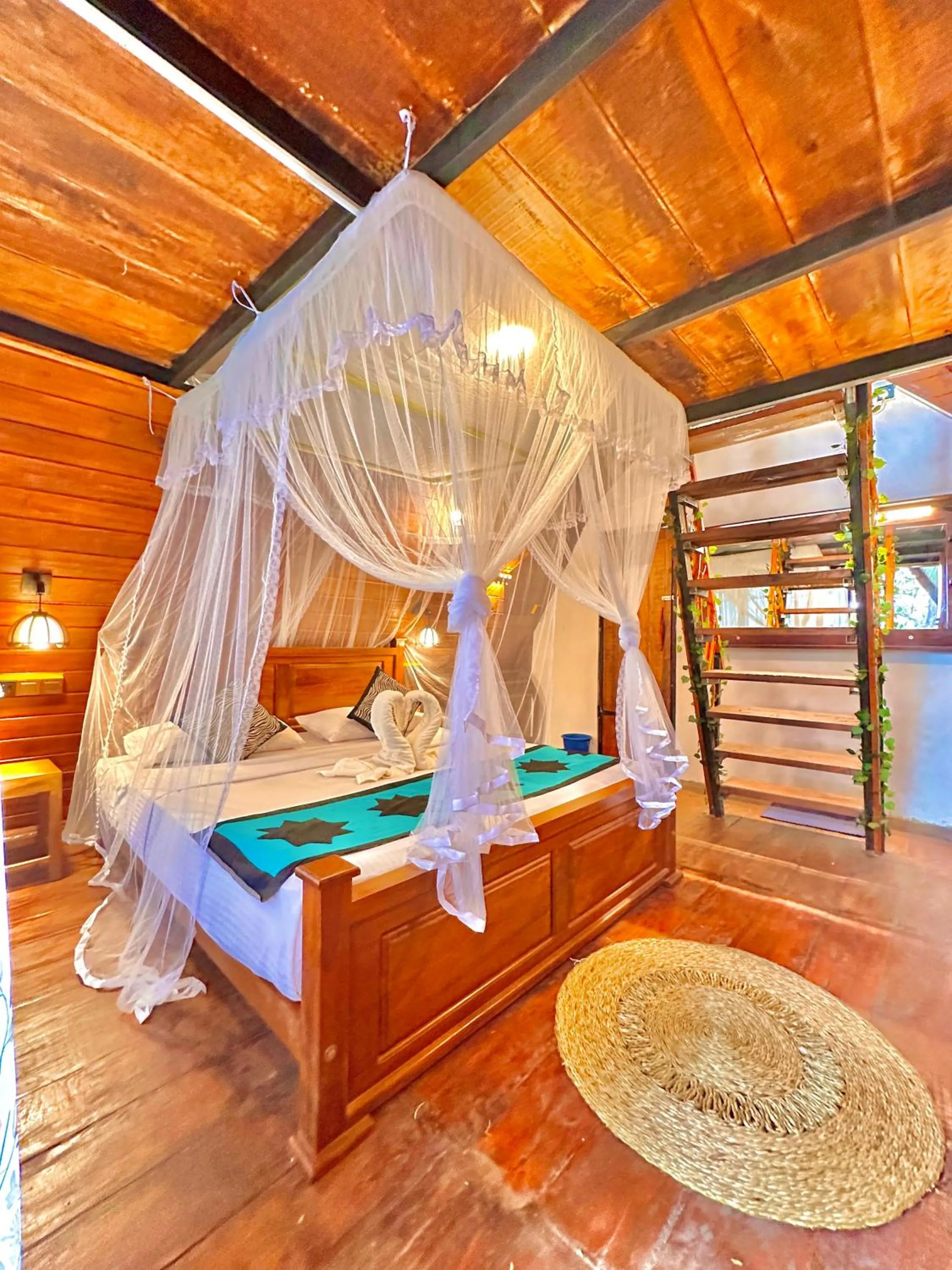 Bed in Levona Garden Resort