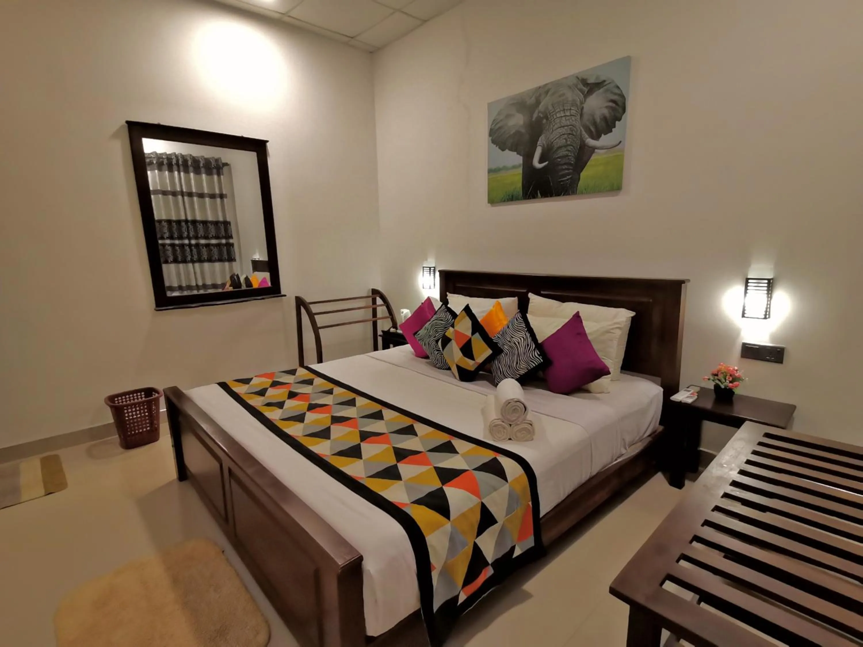 Bed in Levona Garden Resort