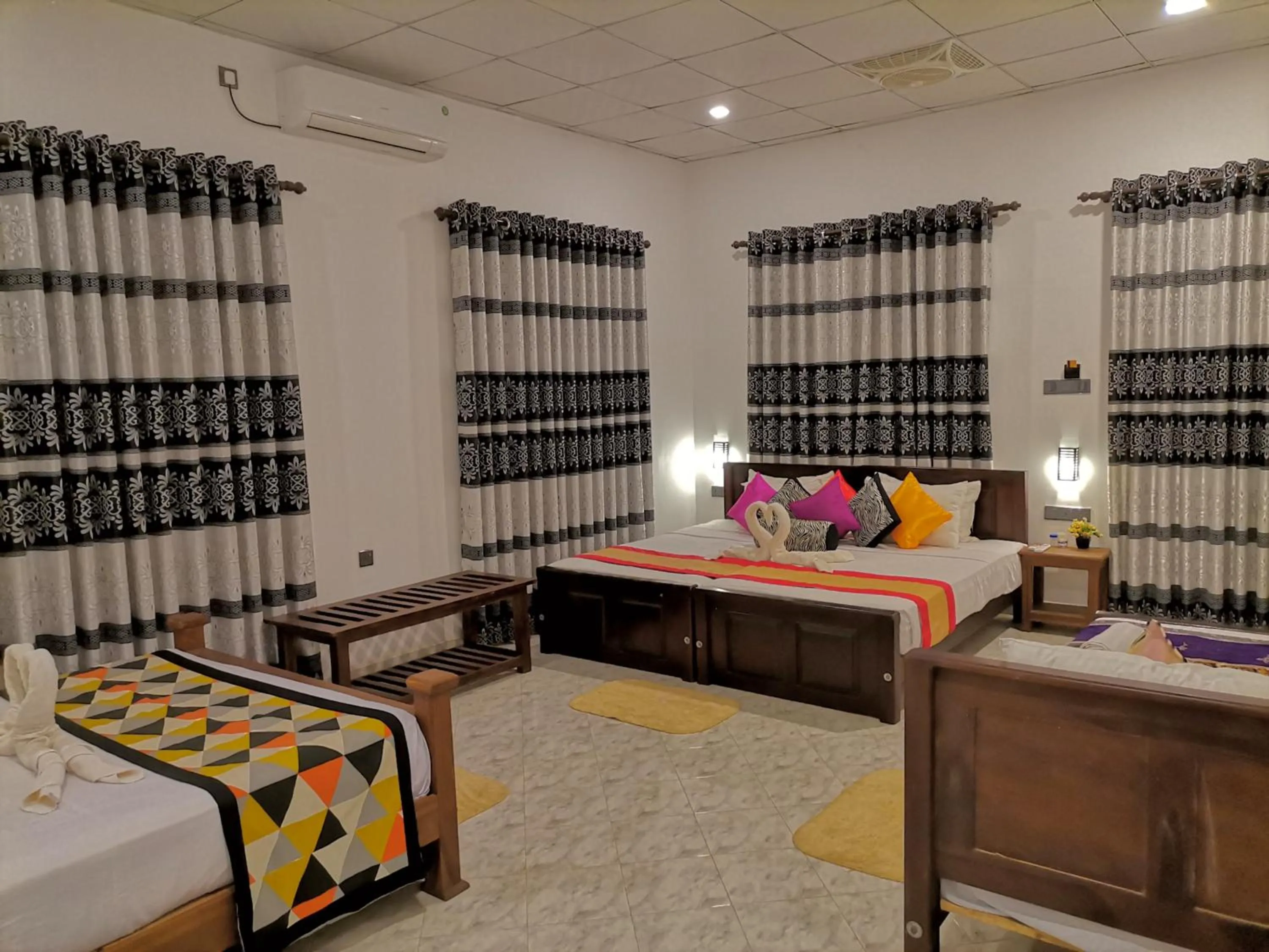 Bed in Levona Garden Resort