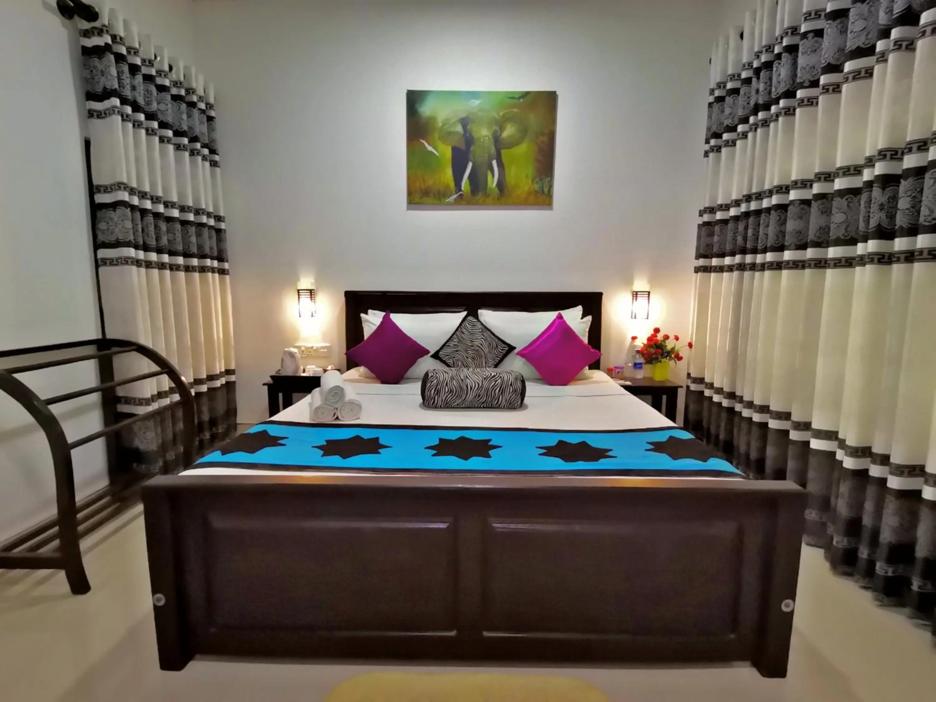 Bed in Levona Garden Resort
