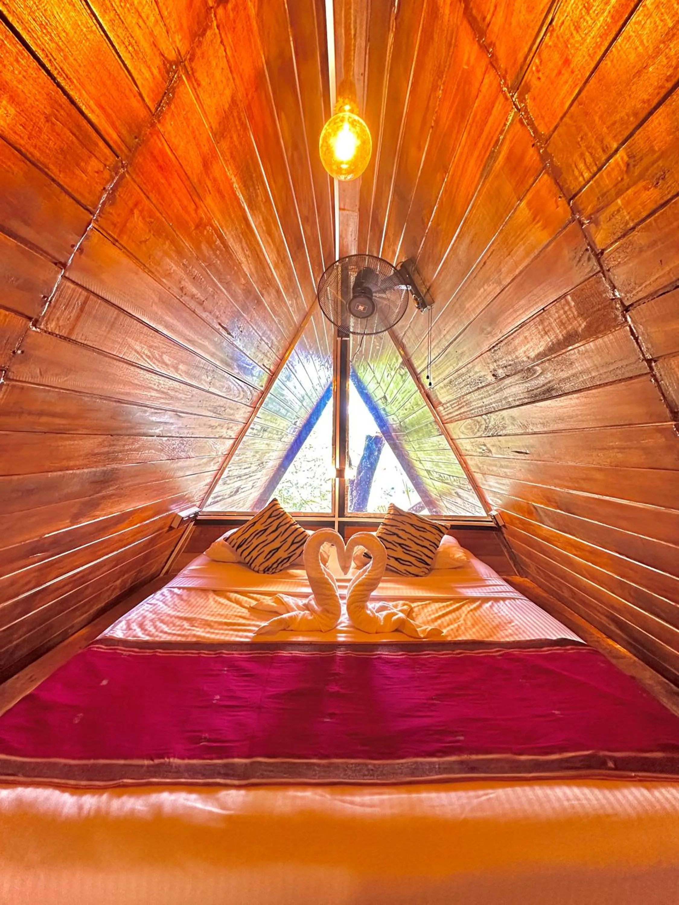 Bed in Levona Garden Resort