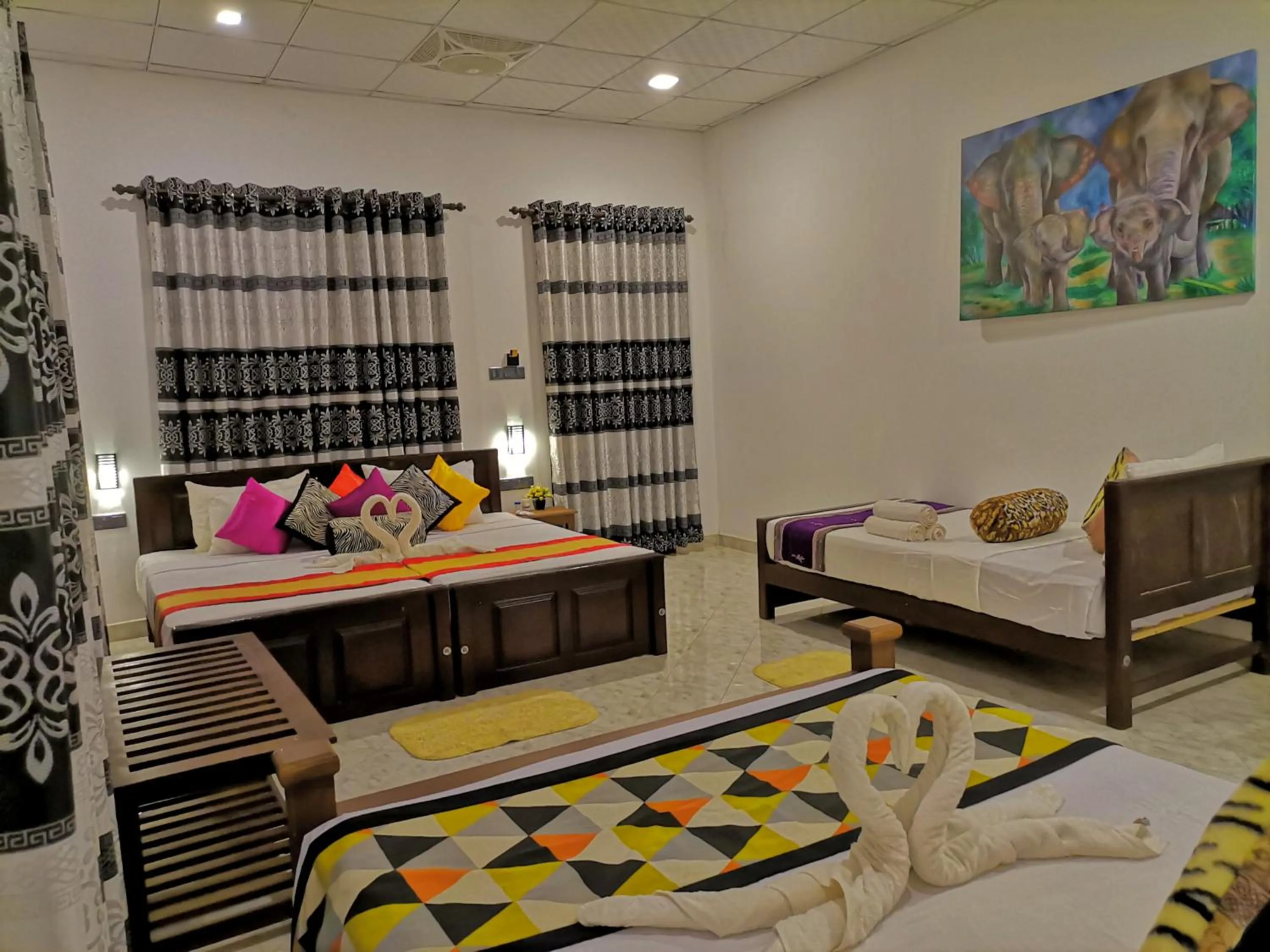 Bed in Levona Garden Resort