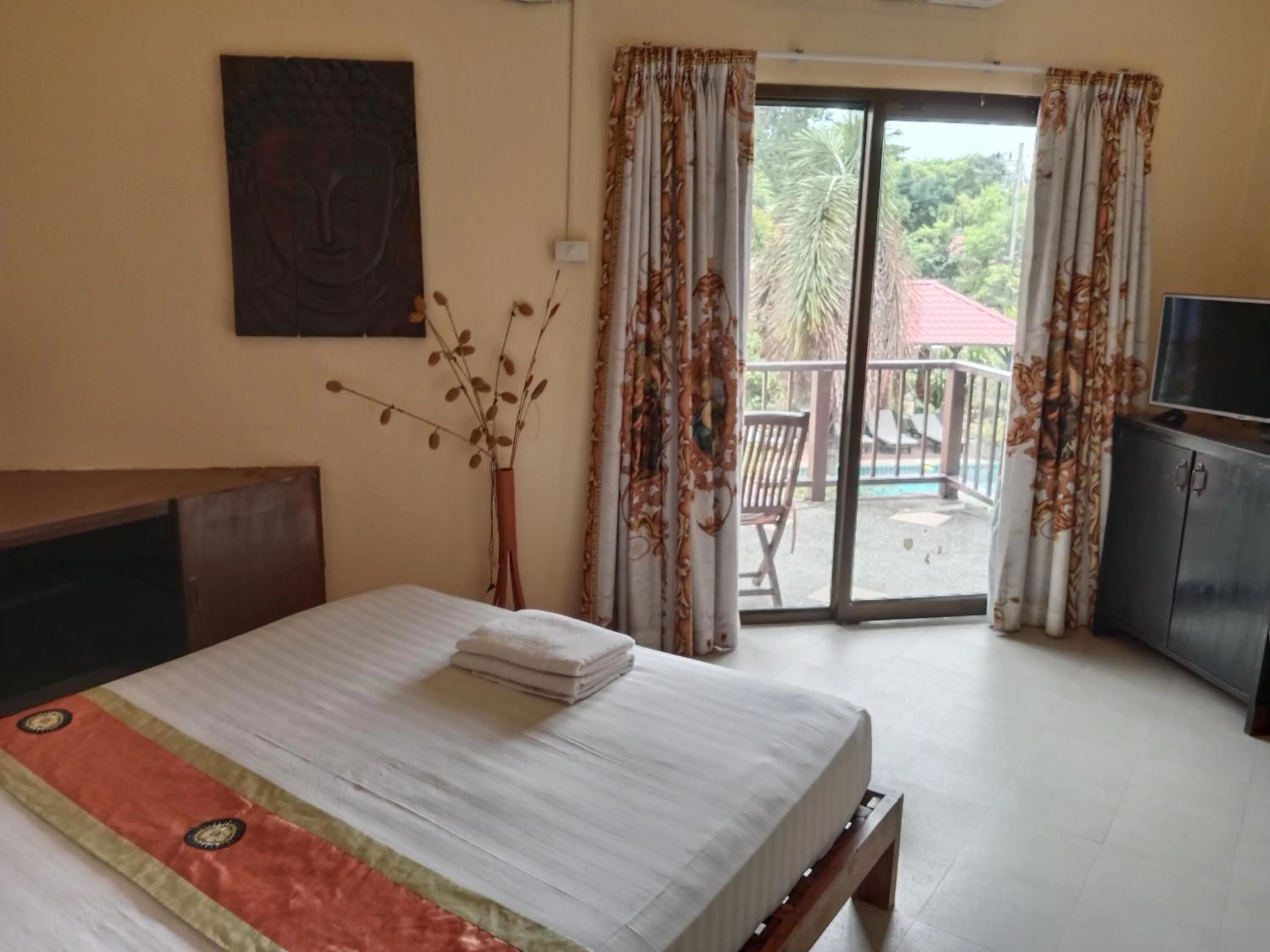 Bed in Baan Tropicana